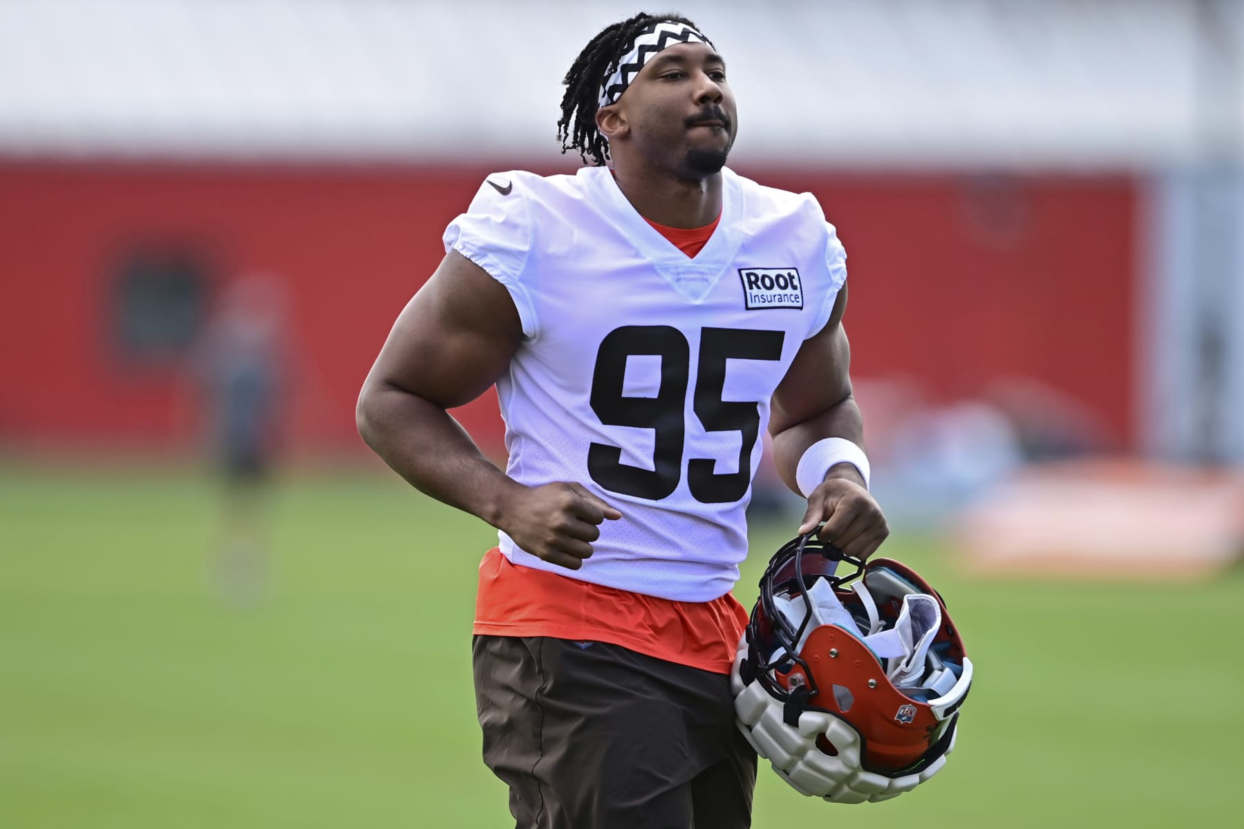 Cleveland Browns defensive end Myles Garrett runs during an NFL football practice in Berea, Ohio, Friday, July 29, 2022. (AP Photo/David Dermer)