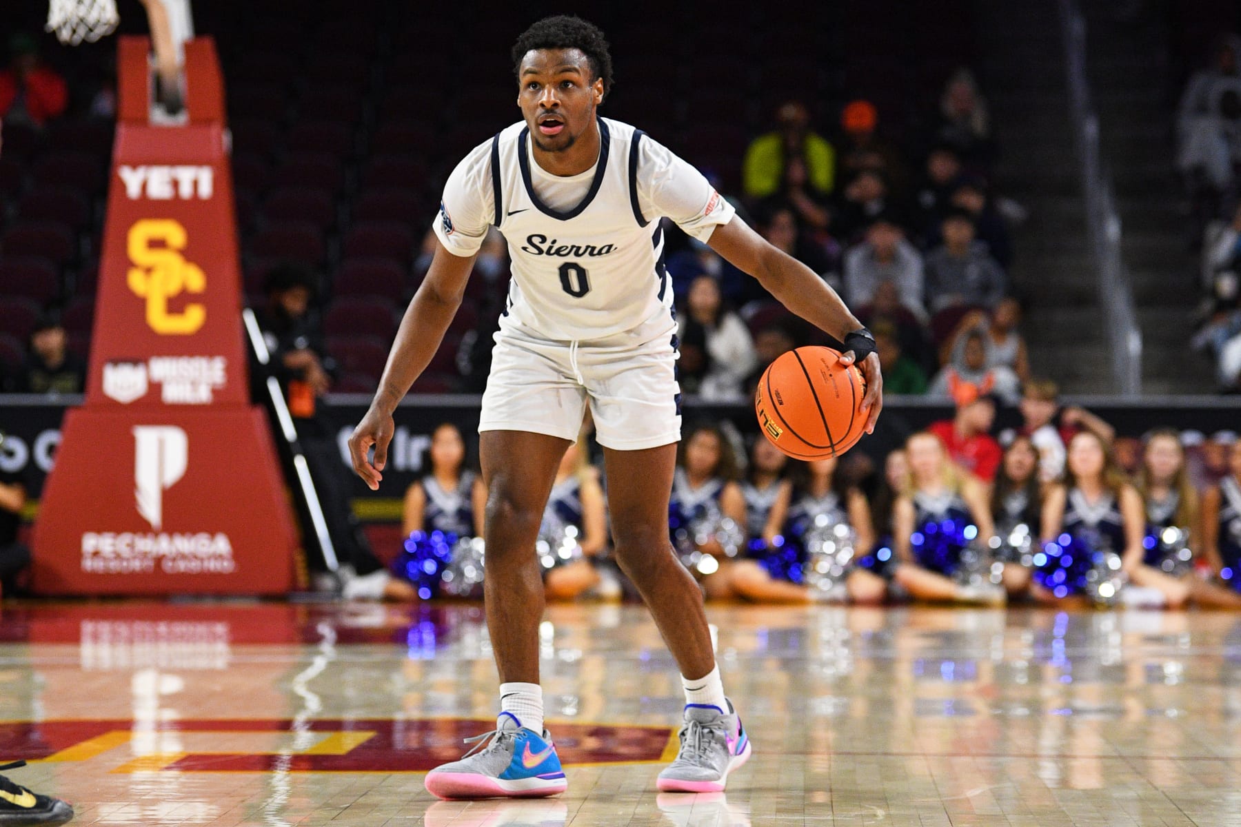 LOS ANGELES, CA - JANUARY 07: Sierra Canyon guard Bronny James dribbles up the court during a high school basketball game between Sierra Canyon and Wheeler in The Chosen-1's Invitational at Galen Center on January 7, 2023 in Los Angeles, California. (Photo by Brian Rothmuller/Icon Sportswire via Getty Images).