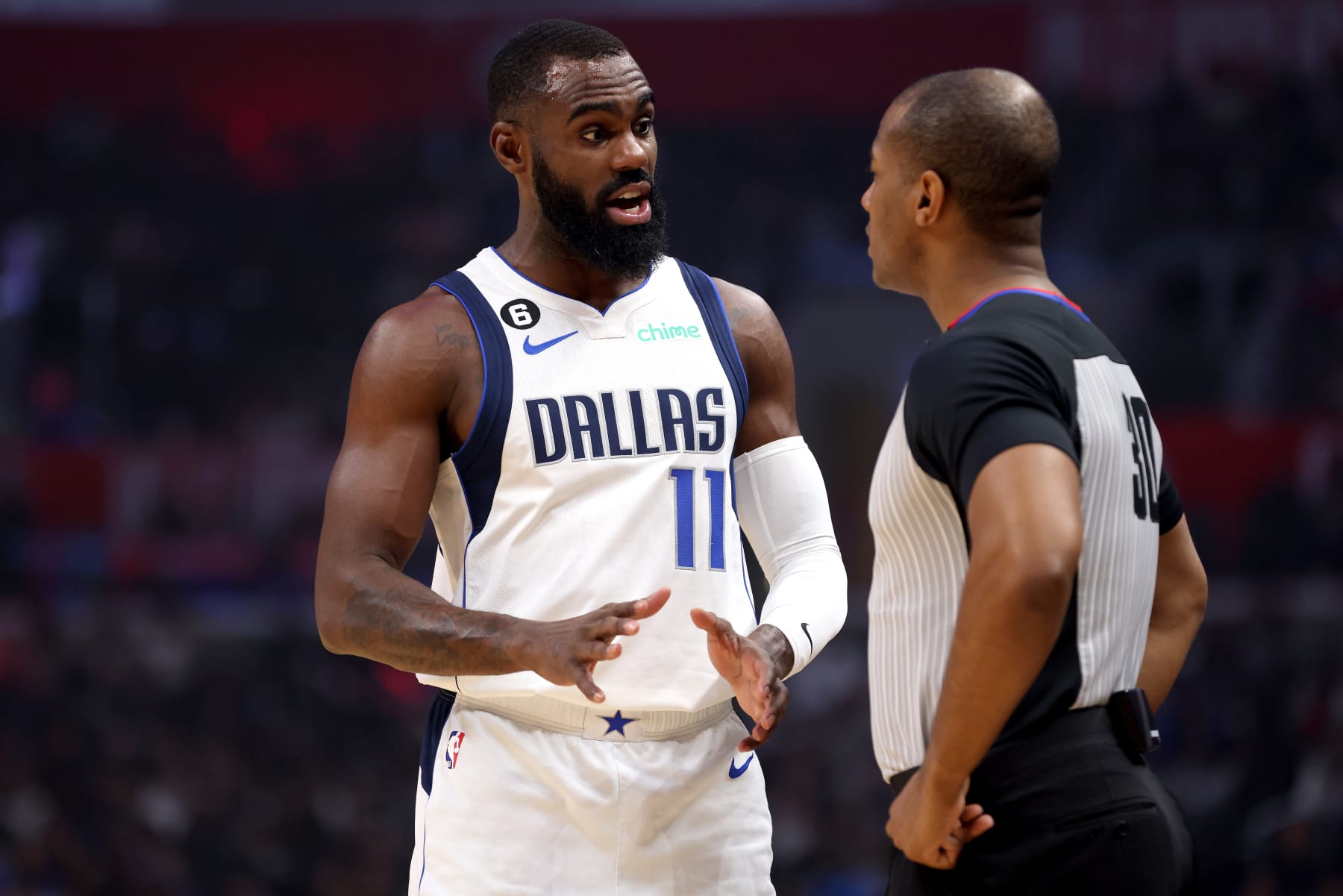 LOS ANGELES, CALIFORNIA - JANUARY 10: Tim Hardaway Jr. #11 of the Dallas Mavericks talks with referee John Butler #30 during the first quarter against the Los Angeles Clippers at Crypto.com Arena on January 10, 2023 in Los Angeles, California. NOTE TO USER: User expressly acknowledges and agrees that, by downloading and or using this photograph, User is consenting to the terms and conditions of the Getty Images License Agreement. (Photo by Katelyn Mulcahy/Getty Images)