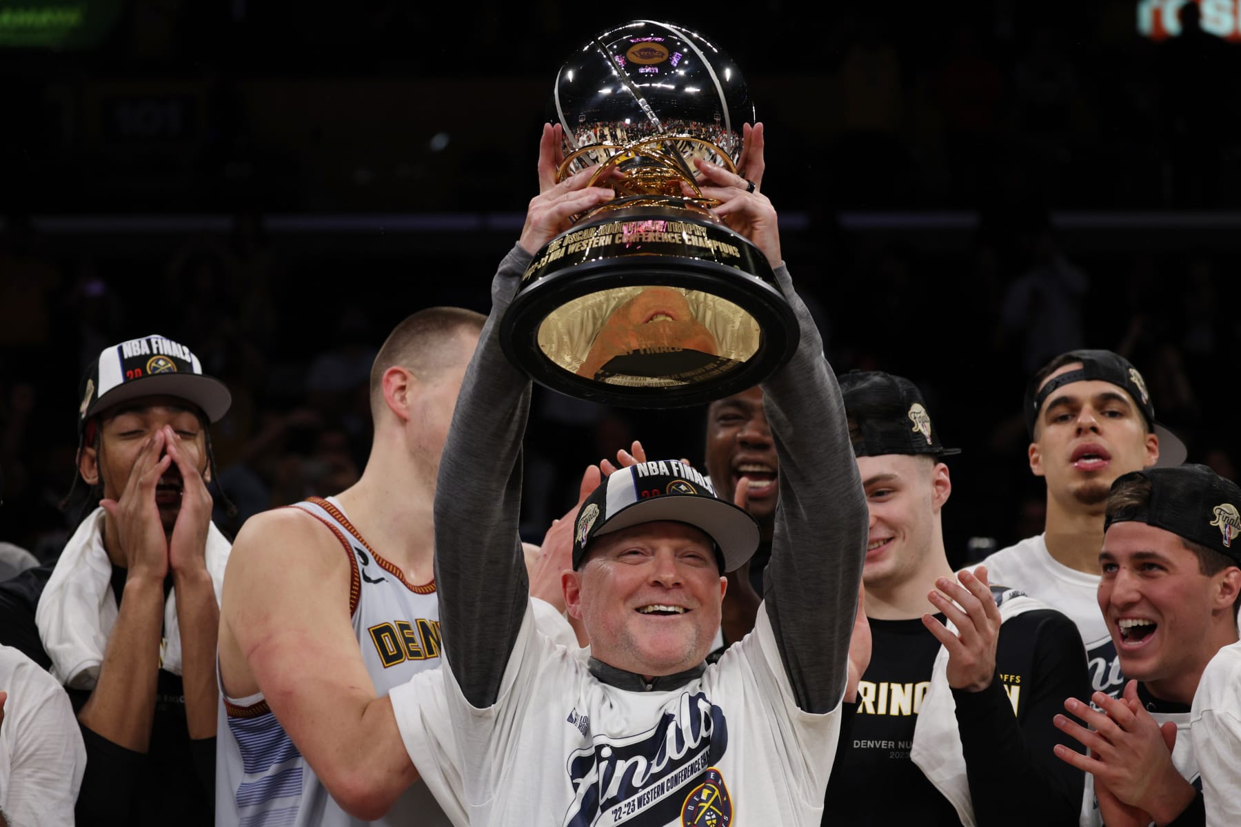 LOS ANGELES, CALIFORNIA - MAY 22: Head coach Michael Malone of the Denver Nuggets celebrates with the Western Conference Championship Trophy after defeating the Los Angeles Lakers in game four of the Western Conference Finals at Crypto.com Arena on May 22, 2023 in Los Angeles, California. NOTE TO USER: User expressly acknowledges and agrees that, by downloading and or using this photograph, User is consenting to the terms and conditions of the Getty Images License Agreement. (Photo by Harry How/Getty Images)