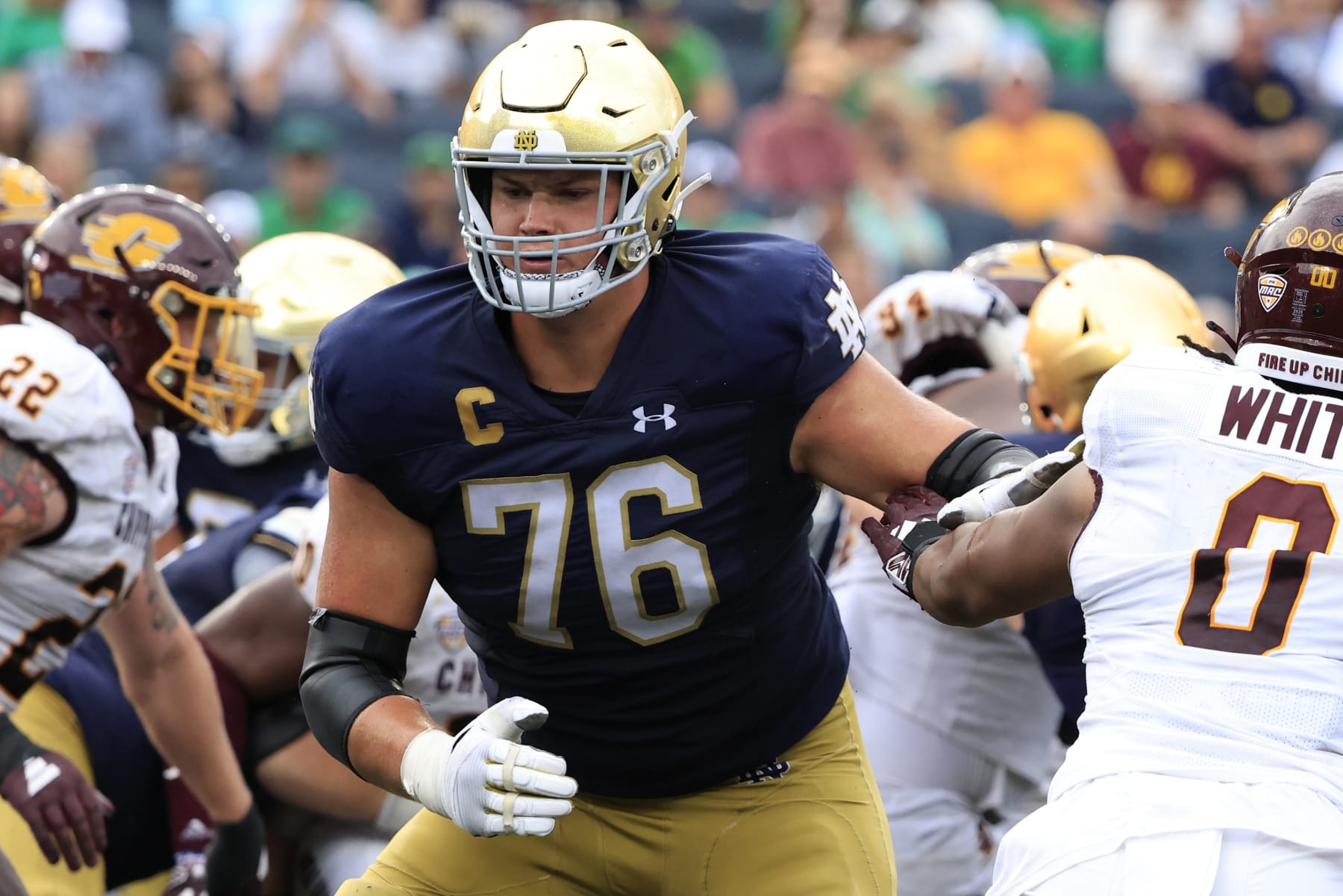 SOUTH BEND, INDIANA - SEPTEMBER 16: Joe Alt #76 of the Notre Dame Fighting Irish blocks Maurice White #0 of the Central Michigan Chippewas at Notre Dame Stadium on September 16, 2023 in South Bend, Indiana. (Photo by Justin Casterline/Getty Images)
