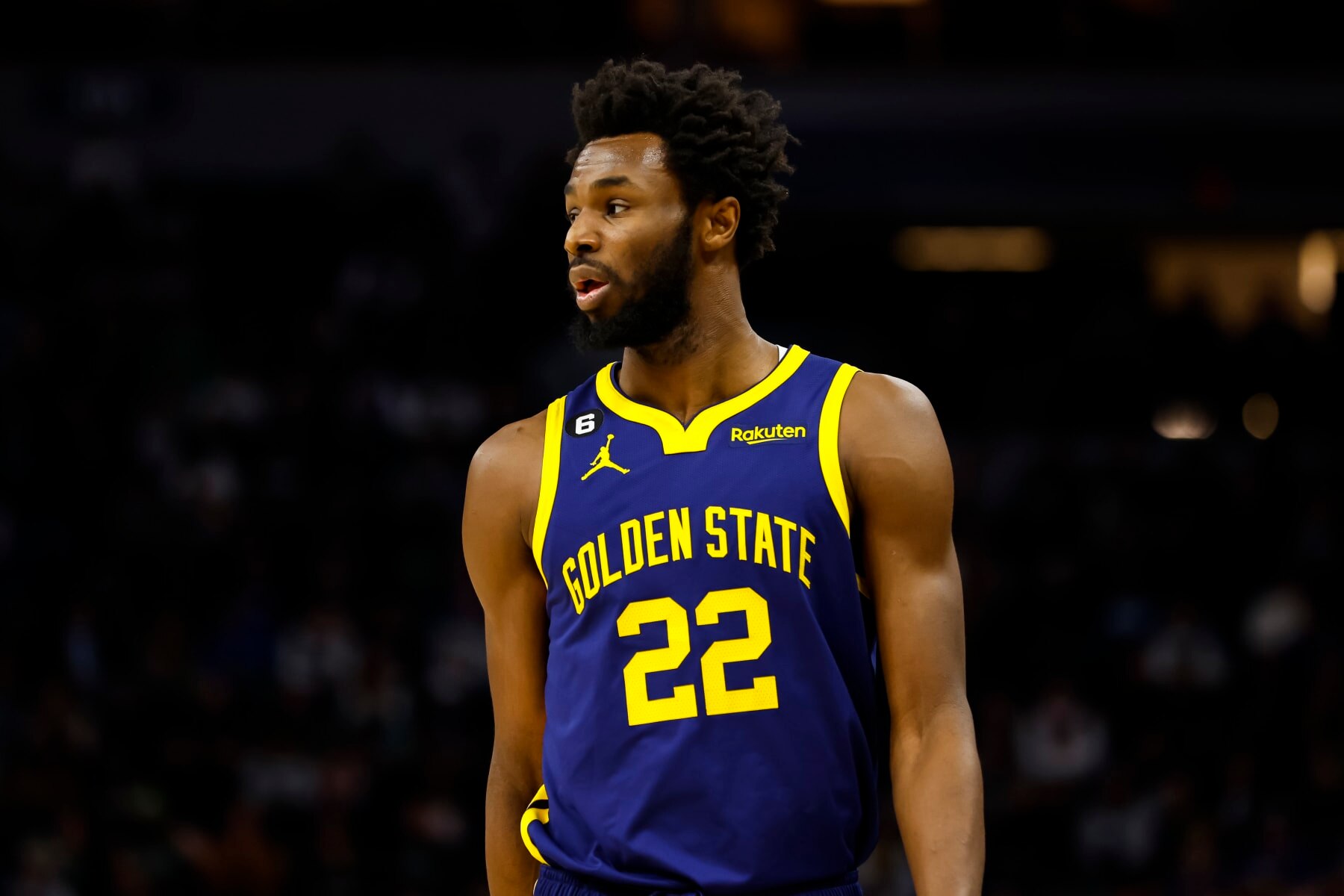 MINNEAPOLIS, MN - NOVEMBER 27: Andrew Wiggins #22 of the Golden State Warriors looks on against the Minnesota Timberwolves in the first quarter of the game at Target Center on November 27, 2022 in Minneapolis, Minnesota. The Warriors defeated the Timberwolves 137-114. NOTE TO USER: User expressly acknowledges and agrees that, by downloading and or using this Photograph, user is consenting to the terms and conditions of the Getty Images License Agreement. (Photo by David Berding/Getty Images)