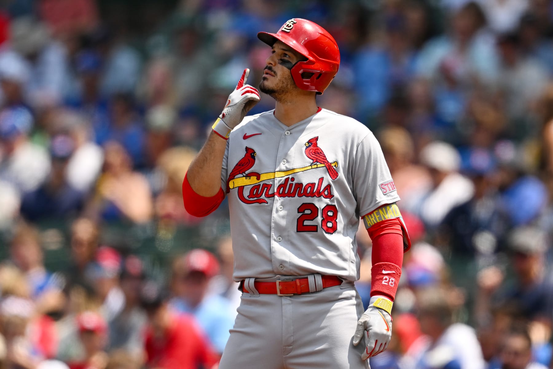 CHICAGO, ILLINOIS - JULY 23: Nolan Arenado #28 of the St. Louis Cardinals reacts at first base after his single in the first inning against the Chicago Cubs at Wrigley Field on July 23, 2023 in Chicago, Illinois. (Photo by Quinn Harris/Getty Images)