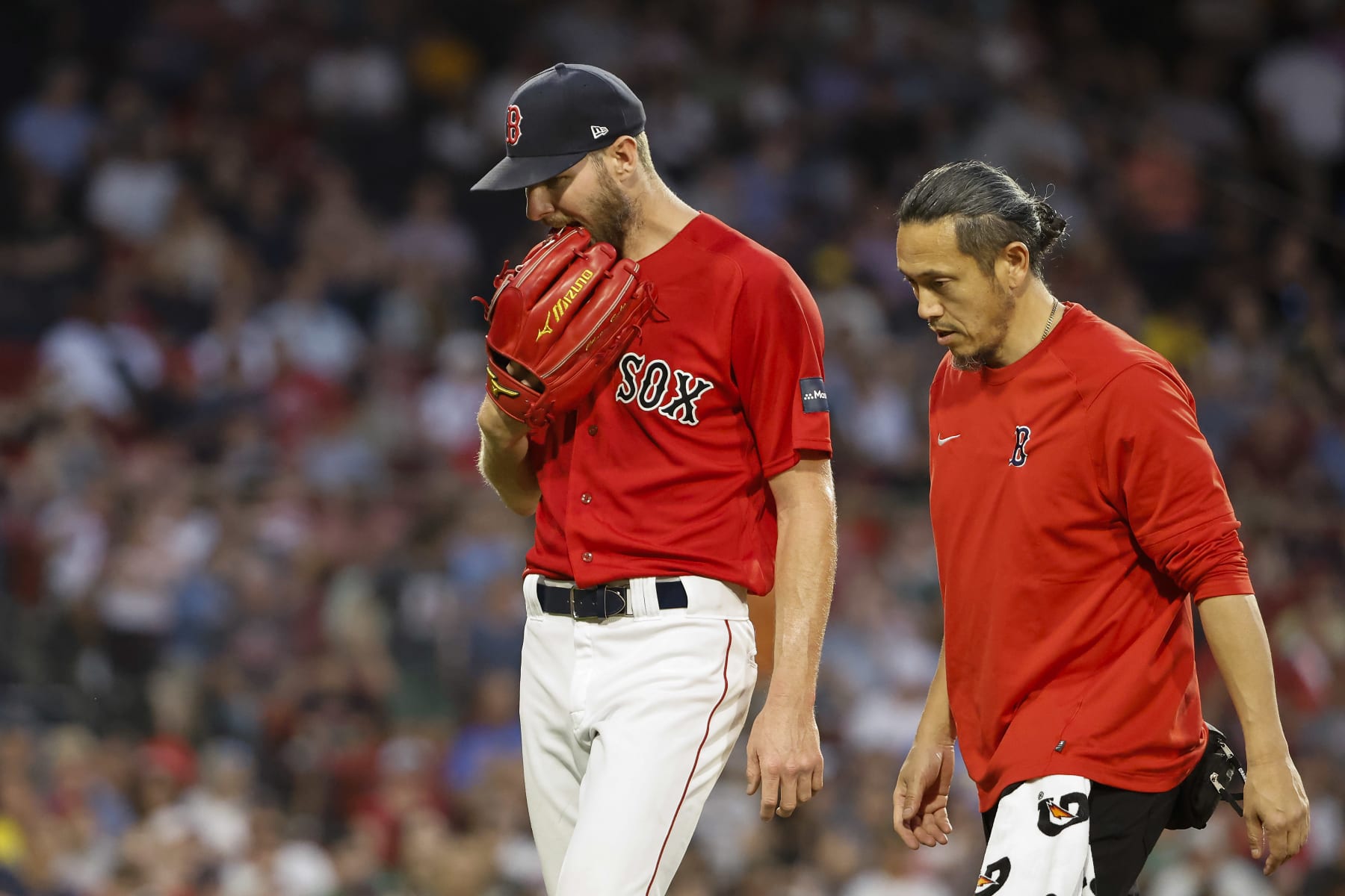 BOSTON, MA - JUNE 1: Chris Sale #41 of the Boston Red Sox bites on his glove as he leaves the game in the middle of the fourth inning against the Cincinnati Reds at Fenway Park on June 1, 2023 in Boston, Massachusetts. (Photo By Winslow Townson/Getty Images)