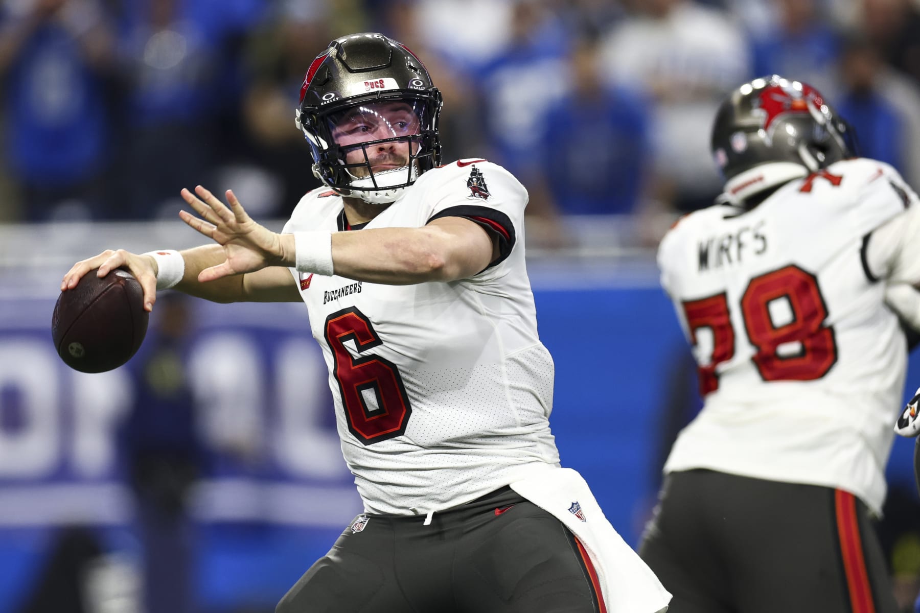 DETROIT, MI - JANUARY 21: Baker Mayfield #6 of the Tampa Bay Buccaneers throws a pass during the second quarter of an NFL divisional round playoff football game against the Detroit Lions at Ford Field on January 21, 2024 in Detroit, Michigan. (Photo by Kevin Sabitus/Getty Images)