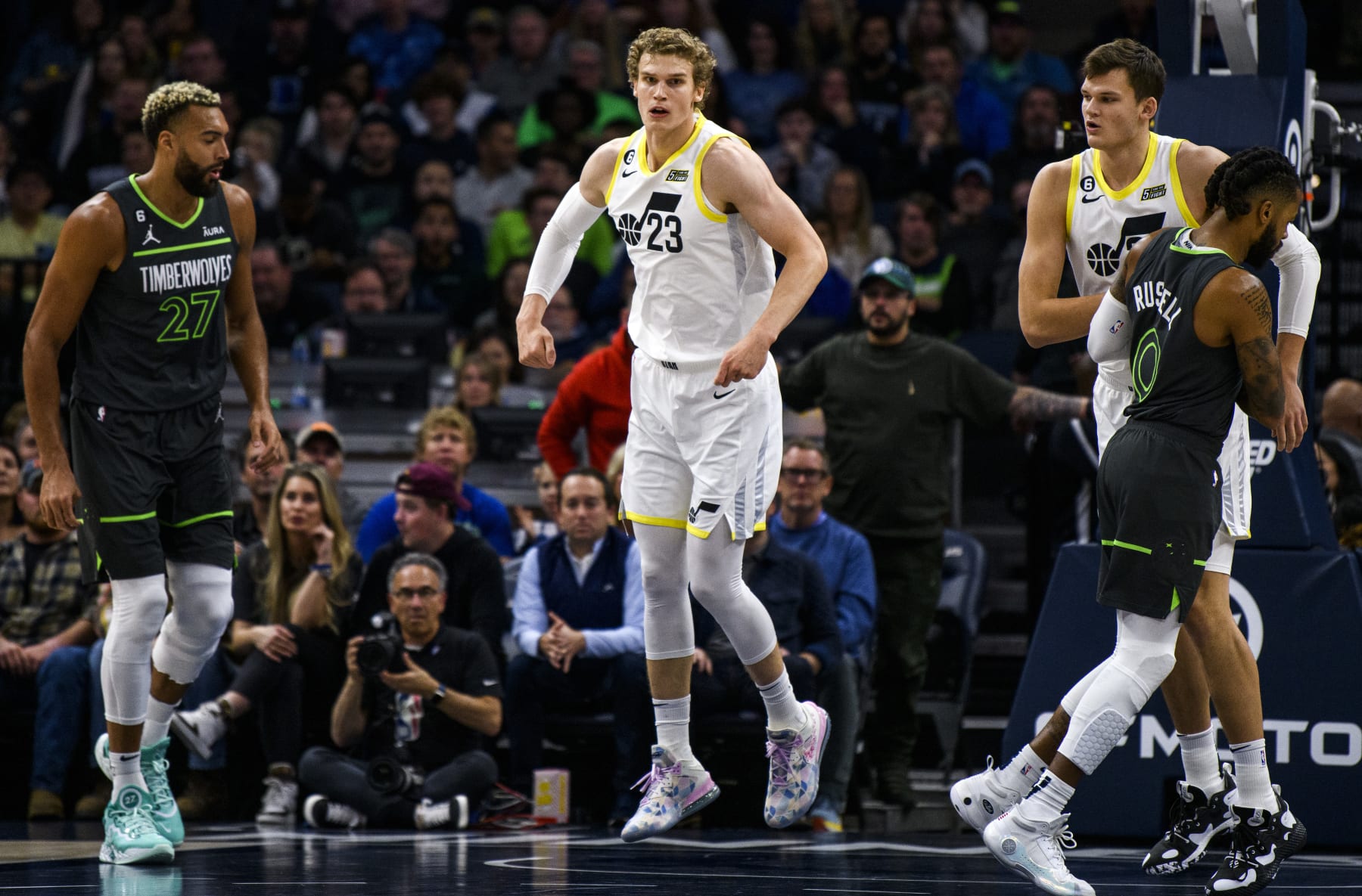 MINNEAPOLIS, MN - OCTOBER 21: Lauri Markkanen #23 of the Utah Jazz celebrates after dunking the ball over Rudy Gobert #27 of the Minnesota Timberwolves in the first quarter of the game at Target Center on October 21, 2022 in Minneapolis, Minnesota. NOTE TO USER: User expressly acknowledges and agrees that, by downloading and or using this photograph, User is consenting to the terms and conditions of the Getty Images License Agreement. (Photo by Stephen Maturen/Getty Images)