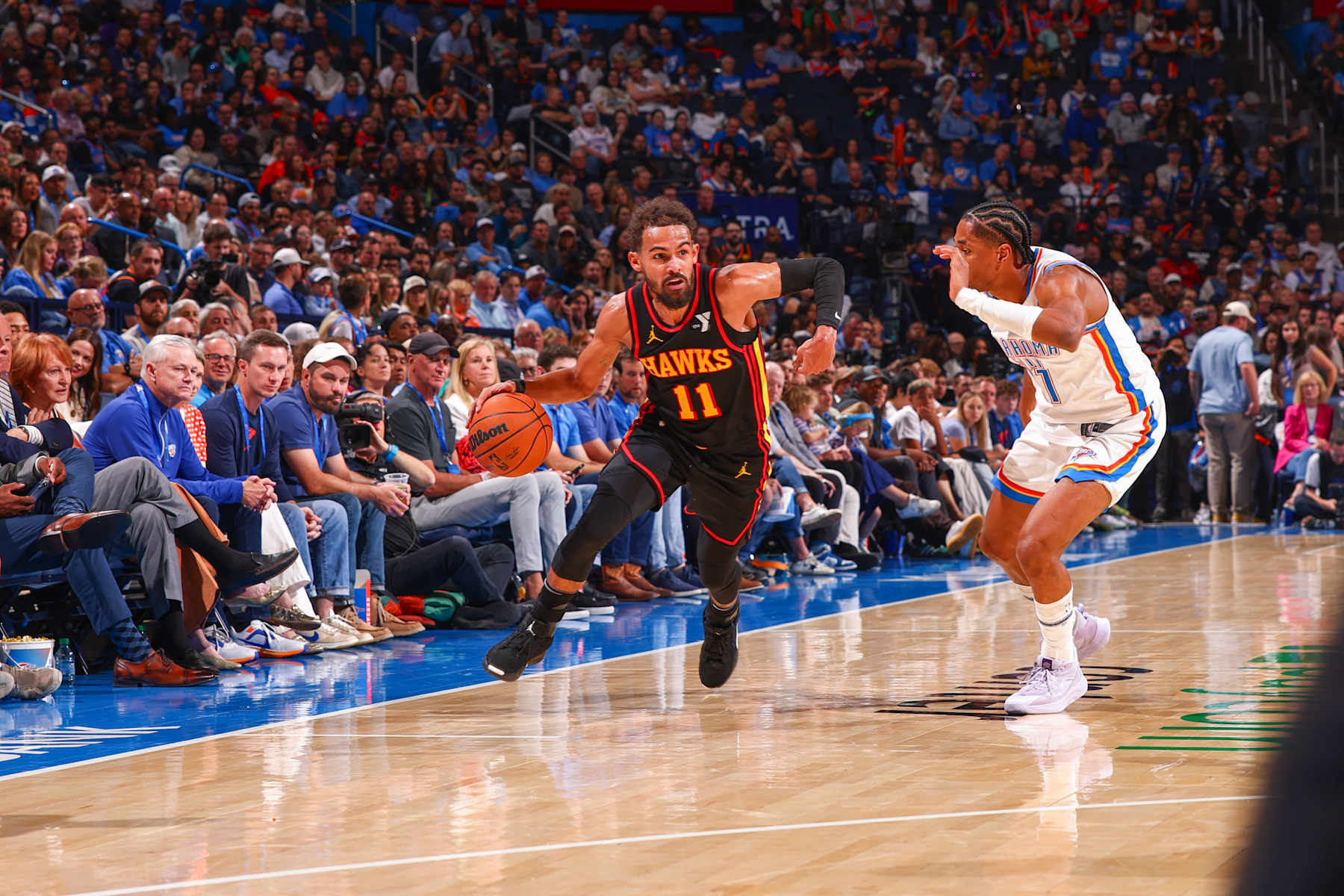 OKLAHOMA CITY, OK - OCTOBER 27: Trae Young #11 of the Atlanta Hawks drives to the basket during the game on October 27, 2024 at Paycom Center in Oklahoma City, Oklahoma. NOTE TO USER: User expressly acknowledges and agrees that, by downloading and or using this photograph, User is consenting to the terms and conditions of the Getty Images License Agreement. Mandatory Copyright Notice: Copyright 2024 NBAE (Photo by Zach Beeker/NBAE via Getty Images)