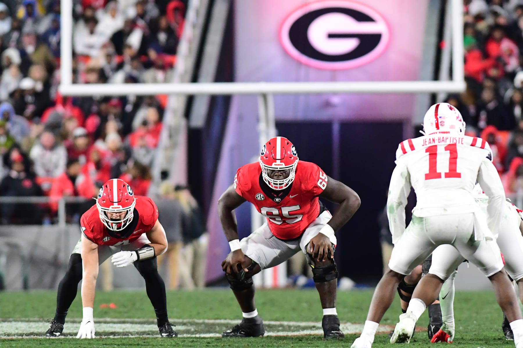 ATHENS, GA - NOVEMBER 11: Amarius Mims #65 during a game between University of Mississippi and University of Georgia at Sanford Stadium on November 11, 2023 in Athens, Georgia. (Photo by Perry McIntyre/ISI Photos/Getty Images)