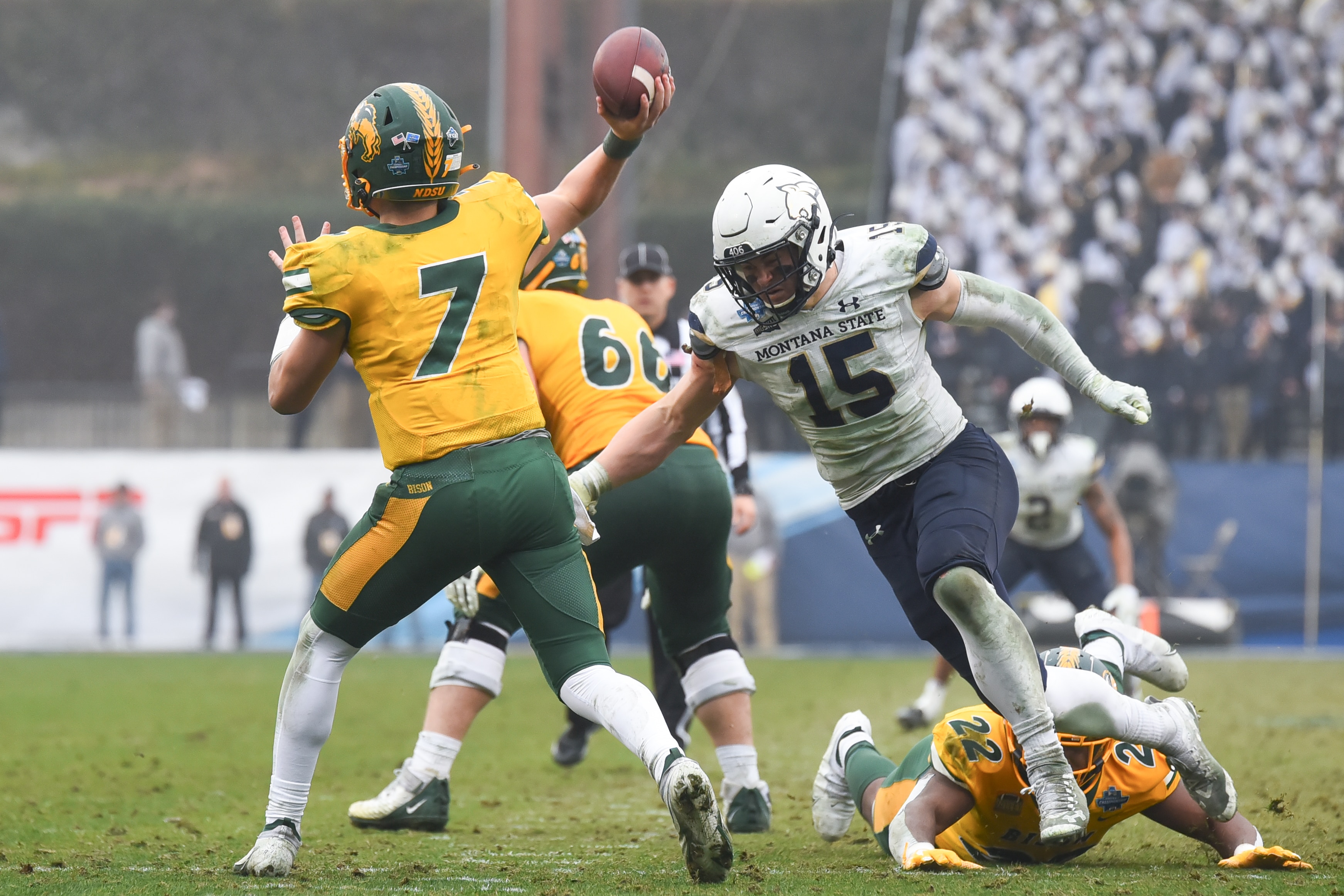 FRISCO, TX - JANUARY 08: Troy Andersen #15 of the Montana State Bobcats rushes Cam Miller #7 of the North Dakota State Bison during the Division I FCS Football Championship held at Toyota Stadium on January 8, 2022 in Frisco, Texas. (Photo by Zach Del Bello/NCAA Photos via Getty Images)