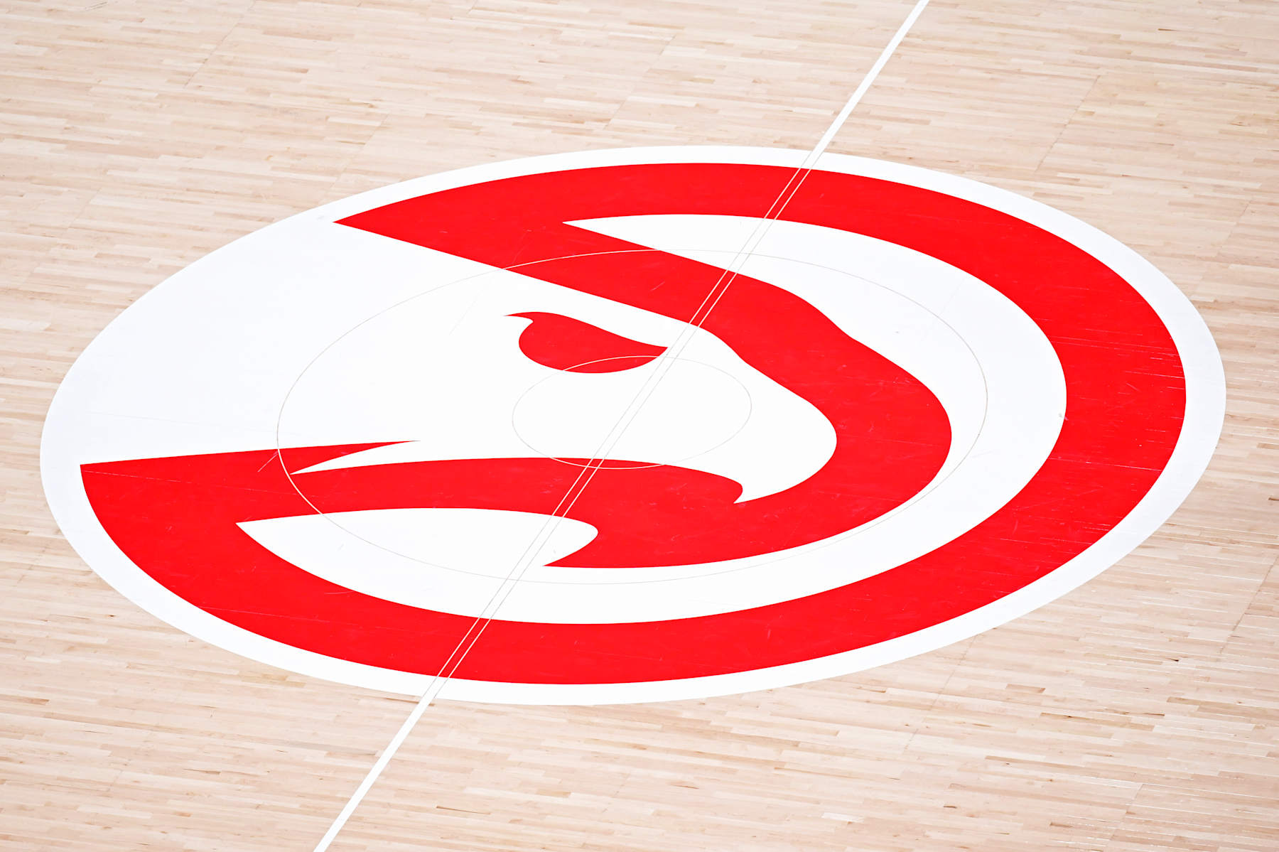 ATLANTA, GA - OCTOBER 23: Detailed shot of Atlanta Hawks center court logo during the game against the Brooklyn Nets on October 23, 2024 at State Farm Arena in Atlanta, Georgia.  NOTE TO USER: User expressly acknowledges and agrees that, by downloading and/or using this Photograph, user is consenting to the terms and conditions of the Getty Images License Agreement. Mandatory Copyright Notice: Copyright 2024 NBAE (Photo by Adam Hagy/NBAE via Getty Images)