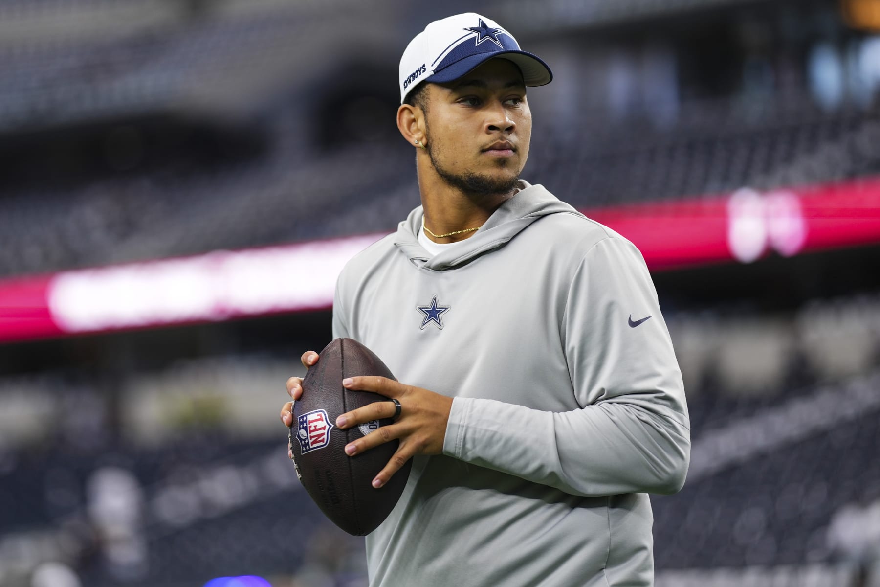 ARLINGTON, TX - SEPTEMBER 17: Trey Lance #15 of the Dallas Cowboys warms up prior to a football game at AT&T Stadium on September 17, 2023 in Arlington, Texas. (Photo by Cooper Neill/Getty Images)