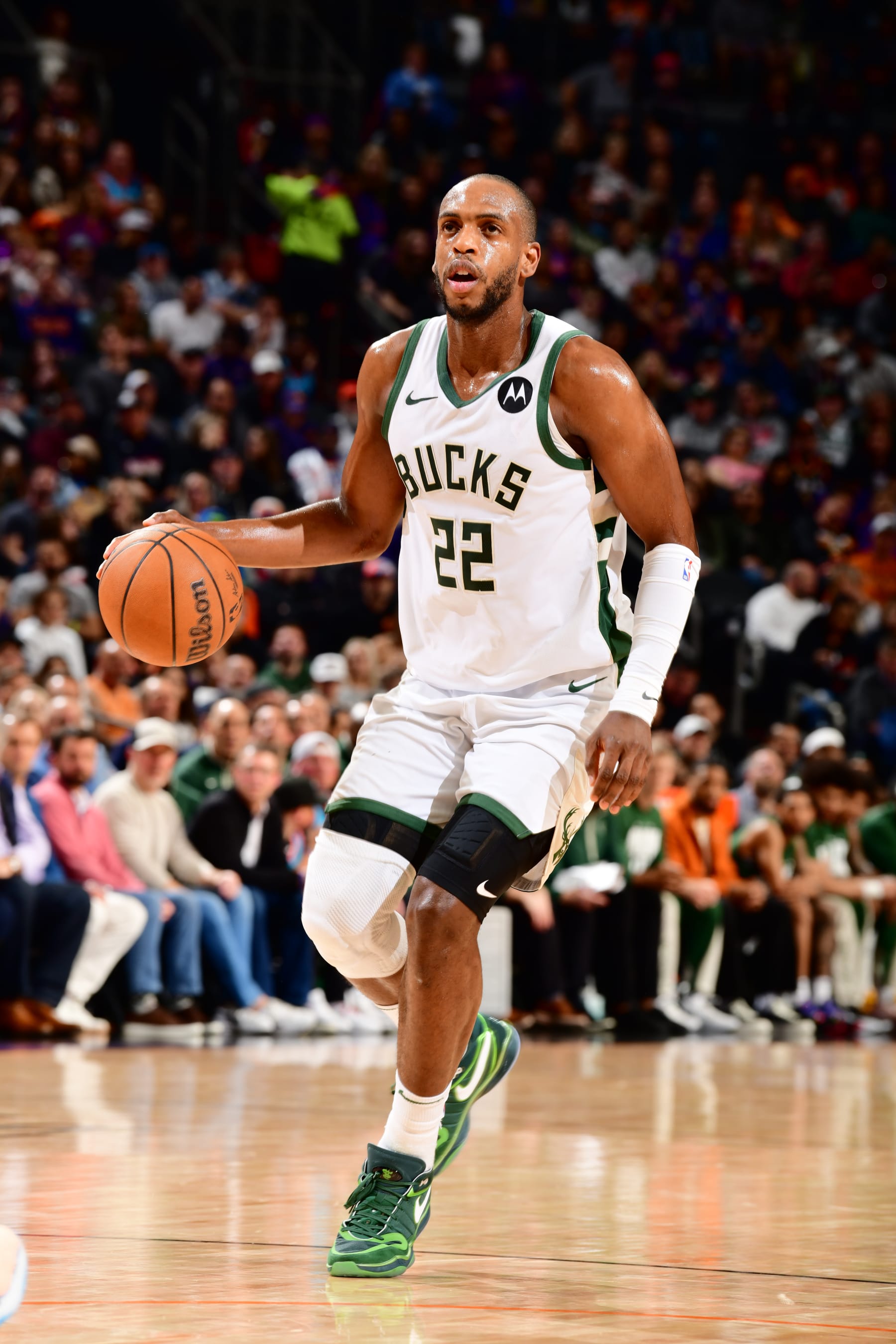 PHOENIX, AZ - FEBRUARY 6:  Khris Middleton #22 of the Milwaukee Bucks handles the ball during the game  on February 6, 2024 at Footprint Center in Phoenix, Arizona. NOTE TO USER: User expressly acknowledges and agrees that, by downloading and or using this photograph, user is consenting to the terms and conditions of the Getty Images License Agreement. Mandatory Copyright Notice: Copyright 2024 NBAE (Photo by Barry Gossage/NBAE via Getty Images)
