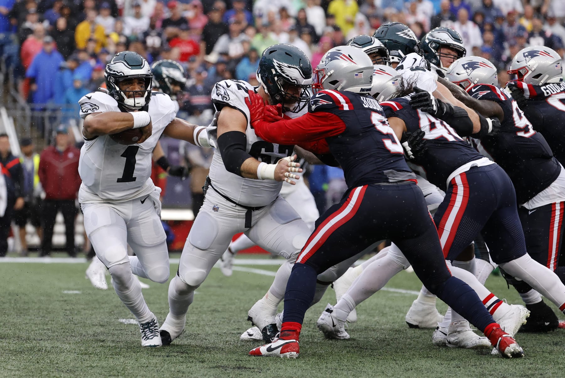 FOXBOROUGH, MA - SEPTEMBER 10: Philadelphia Eagles center Jason Kelce (62) blocks New England Patriots outside linebacker Matthew Judon (9) for Philadelphia Eagles quarterback Jalen Hurts (1) during a game between the New England Patriots and the Philadelphia Eagles on September 10, 2023, at Gillette Stadium in Foxborough, Massachusetts. (Photo by Fred Kfoury III/Icon Sportswire via Getty Images)