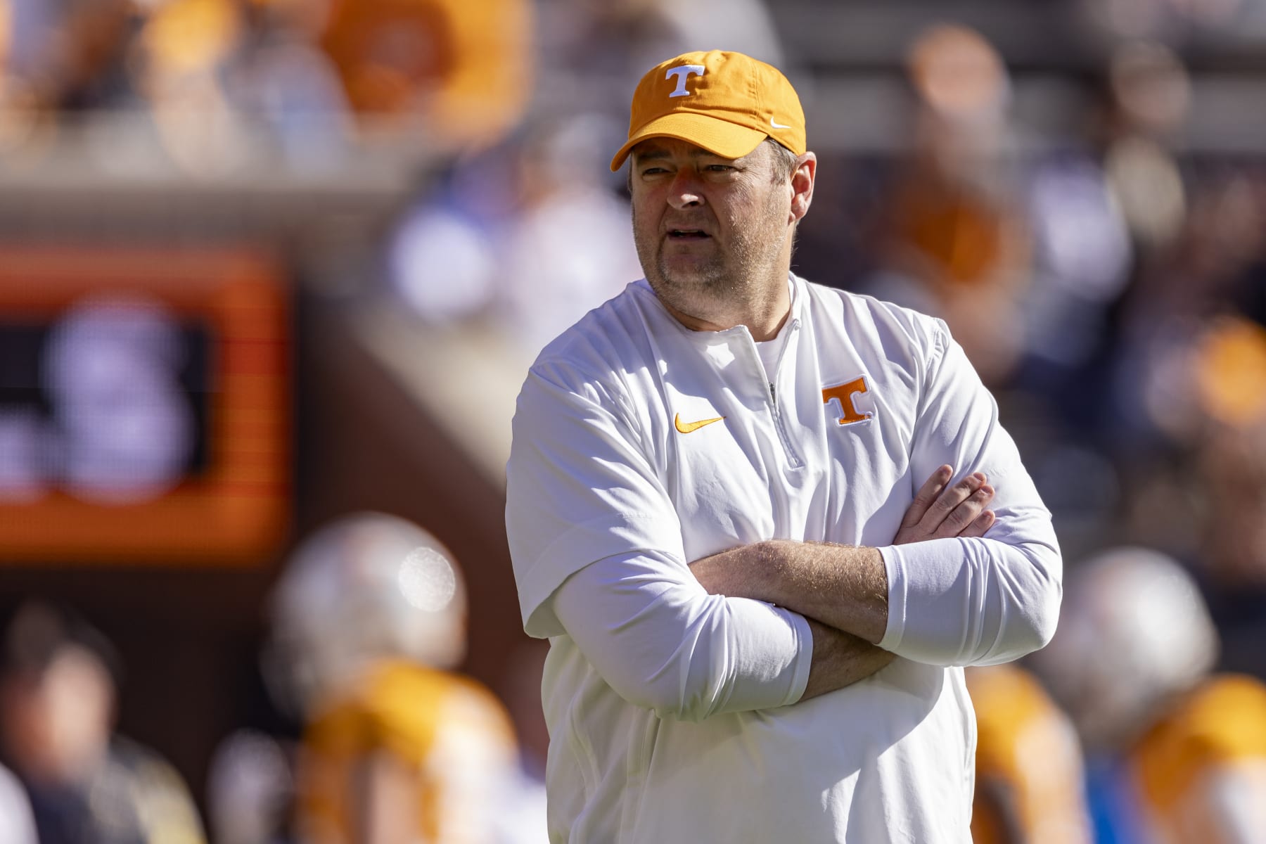 Tennessee head coach Josh Heupel watches players during warmups before of an NCAA college football game against UConn Saturday, Nov. 4, 2023, in Knoxville, Tenn. (AP Photo/Wade Payne)