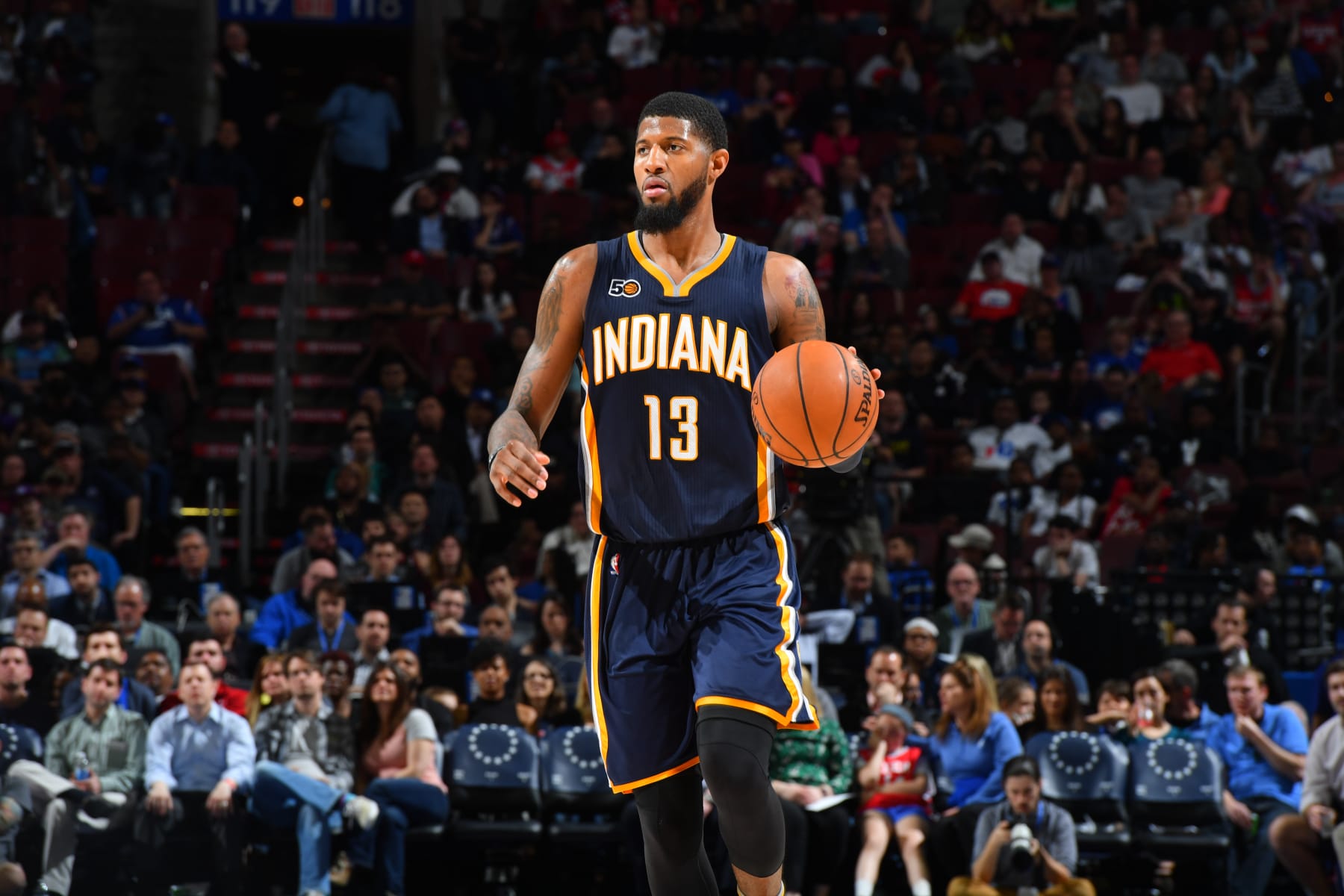 PHILADELPHIA,PA -  APRIL 10 : Paul George #13 of the Indiana Pacers dribbles the ball against the Philadelphia 76ers at Wells Fargo Center on April 10, 2017 in Philadelphia, Pennsylvania NOTE TO USER: User expressly acknowledges and agrees that, by downloading and/or using this Photograph, user is consenting to the terms and conditions of the Getty Images License Agreement. Mandatory Copyright Notice: Copyright 2017 NBAE (Photo by Jesse D. Garrabrant/NBAE via Getty Images)