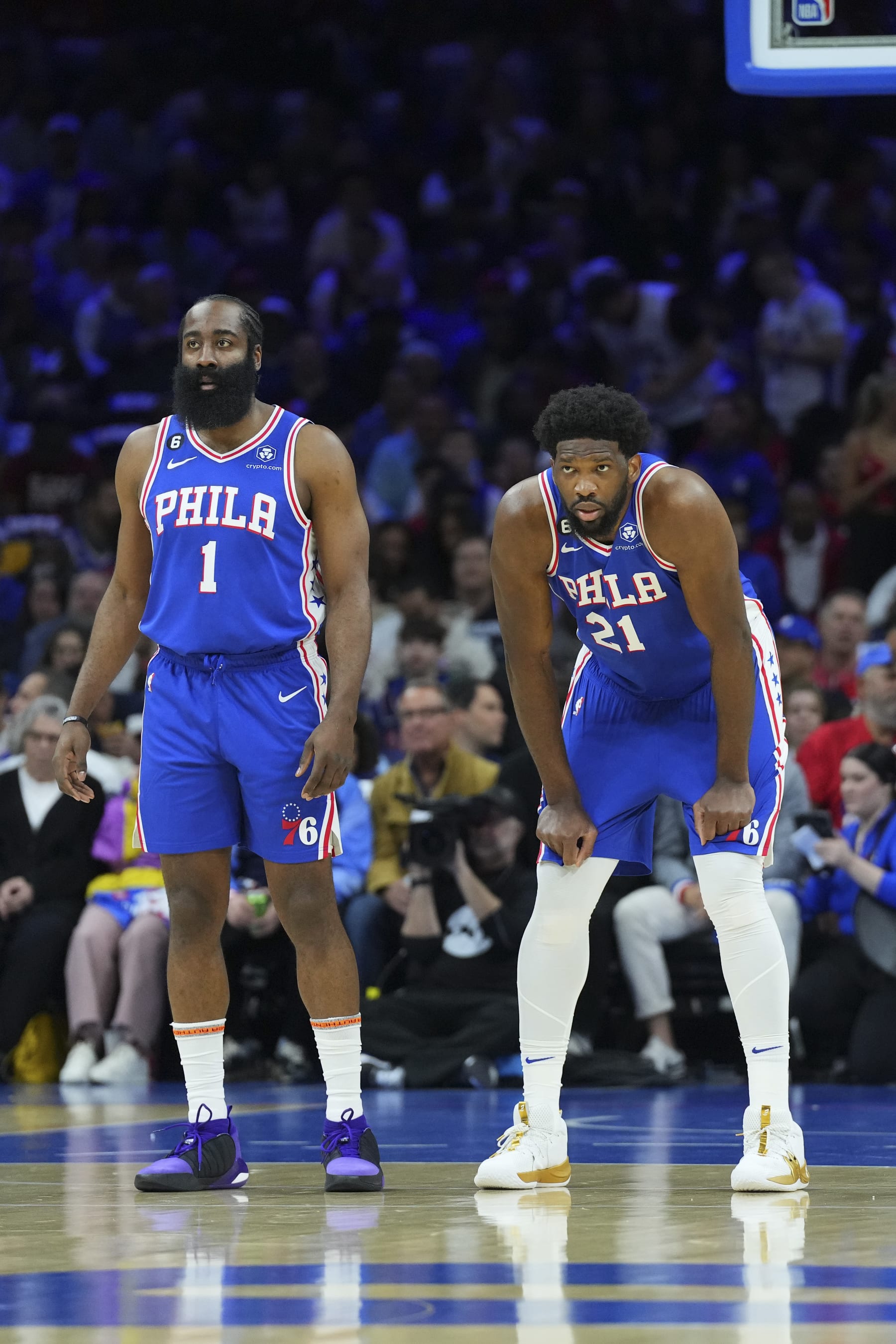 PHILADELPHIA, PA - APRIL 17: James Harden #1 and Joel Embiid #21 of the Philadelphia 76ers look on against the Brooklyn Nets during Game Two of the Eastern Conference First Round Playoffs at the Wells Fargo Center on April 17, 2023 in Philadelphia, Pennsylvania. NOTE TO USER: User expressly acknowledges and agrees that, by downloading and or using this photograph, User is consenting to the terms and conditions of the Getty Images License Agreement. (Photo by Mitchell Leff/Getty Images)