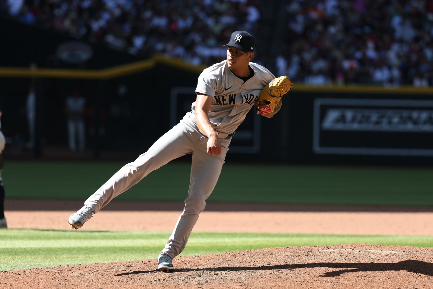 PHOENIX, ARIZONA - APRIL 03: Jonathan Loaisiga #43 of the New York Yankees throws a pitch against the Arizona Diamondbacks during the ninth inning at Chase Field on April 03, 2024 in Phoenix, Arizona. (Photo by Zac BonDurant/Getty Images)