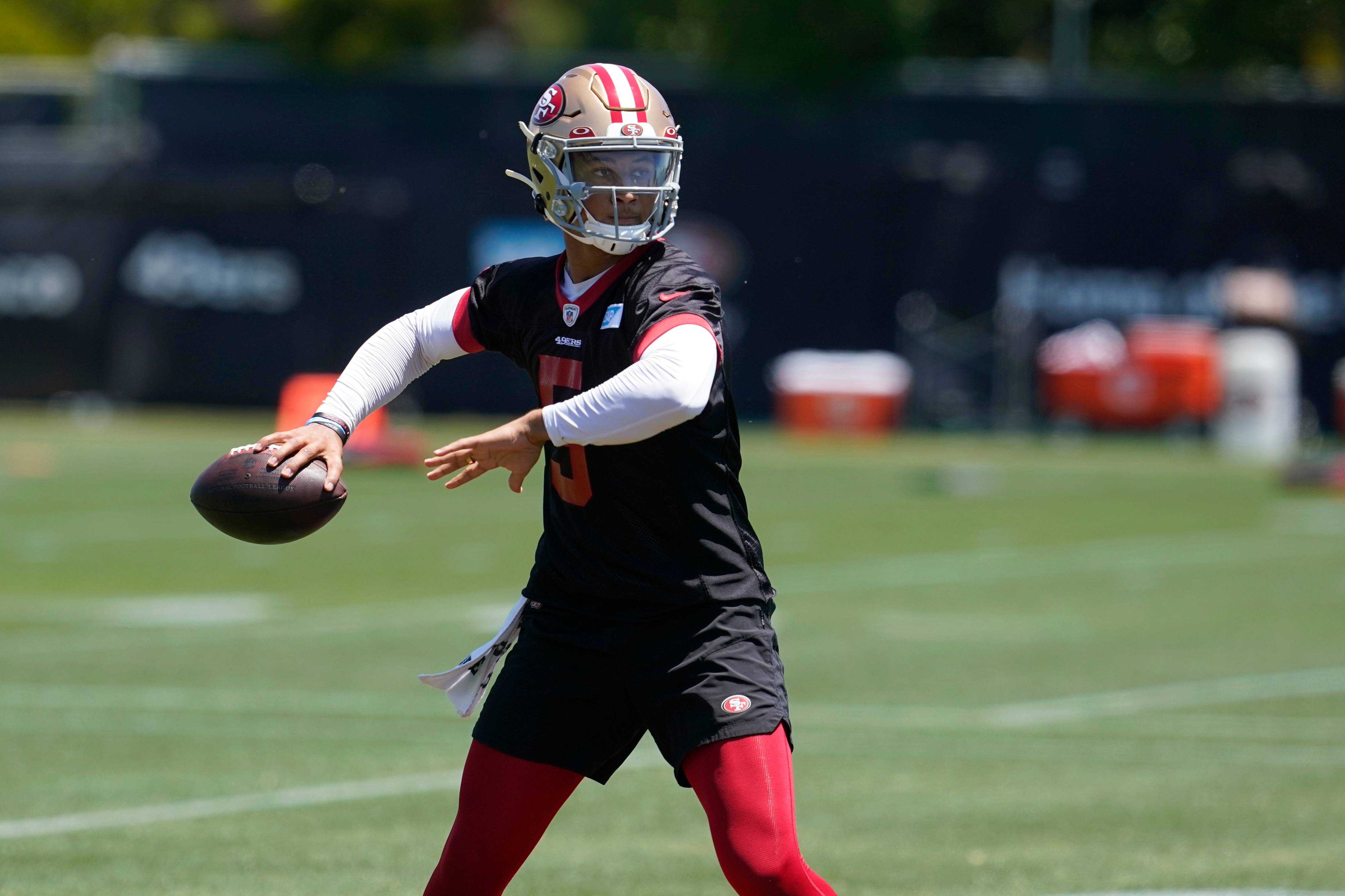 San Francisco 49ers quarterback Trey Lance takes part in drills at the NFL football team's practice facility in Santa Clara, Calif., Tuesday, May 24, 2022. (AP Photo/Jeff Chiu)