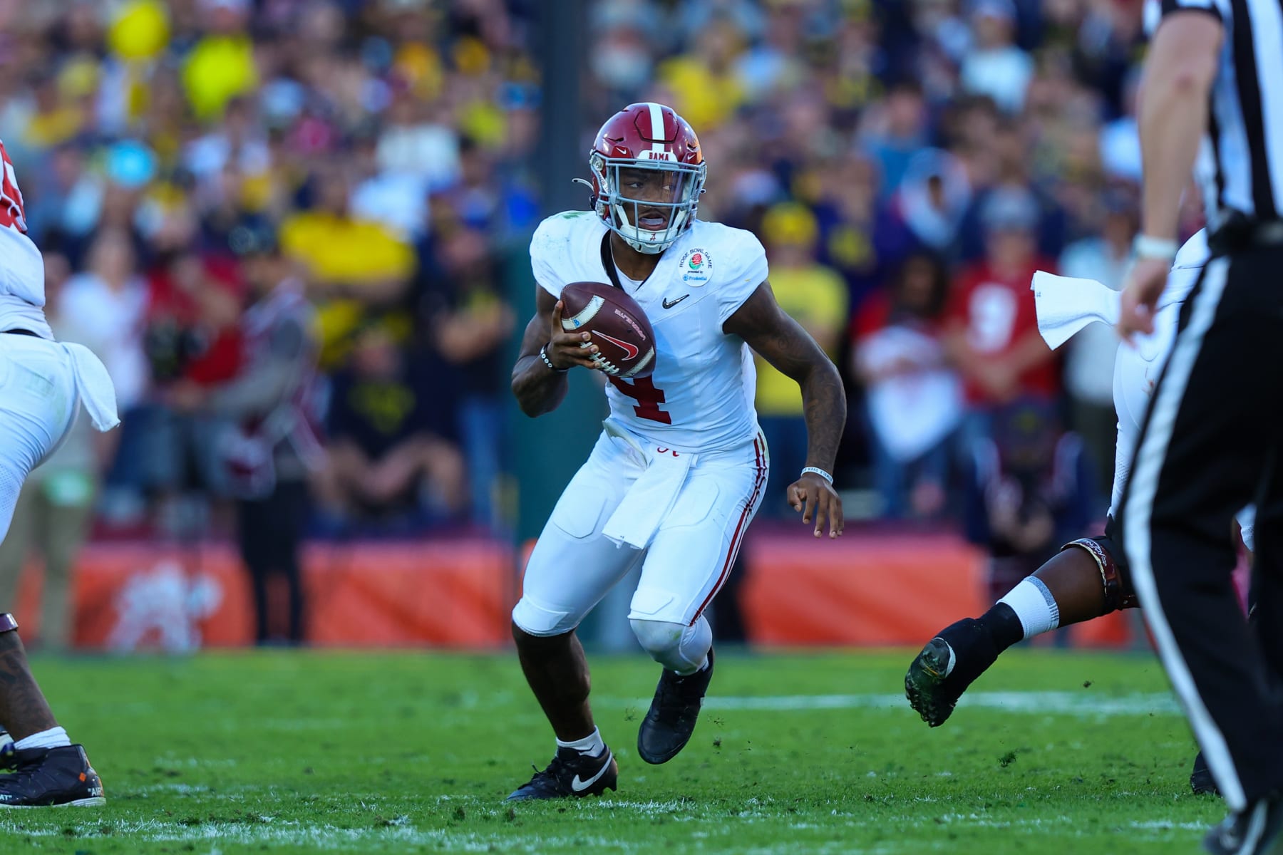 PASADENA, CA - JANUARY 01: Alabama Crimson Tide quarterback Jalen Milroe (4) runs the ball for a gain during the Alabama Crimson Tide game versus the Michigan Wolverines CFP Semifinal at the Rose Bowl Game on January, 1, 2024, at the Rose Bowl Stadium in Pasadena, CA. (Photo by Jordon Kelly/Icon Sportswire via Getty Images)