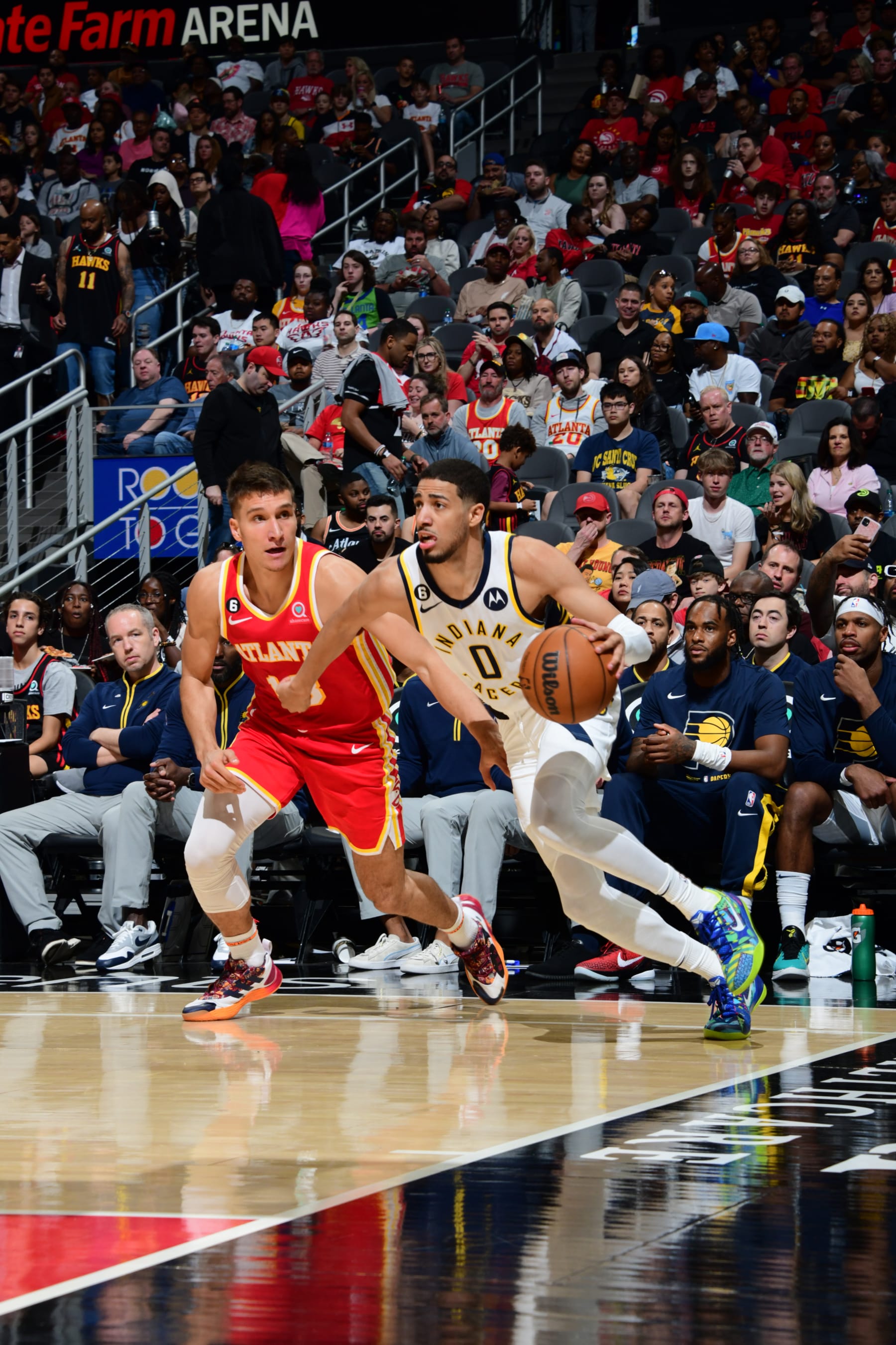 ATLANTA, GA - MARCH 25: Tyrese Haliburton #0 of the Indiana Pacers dribbles the ball during the game against the Atlanta Hawks on March 25, 2023 at State Farm Arena in Atlanta, Georgia.  NOTE TO USER: User expressly acknowledges and agrees that, by downloading and/or using this Photograph, user is consenting to the terms and conditions of the Getty Images License Agreement. Mandatory Copyright Notice: Copyright 2023 NBAE (Photo by Scott Cunningham/NBAE via Getty Images)