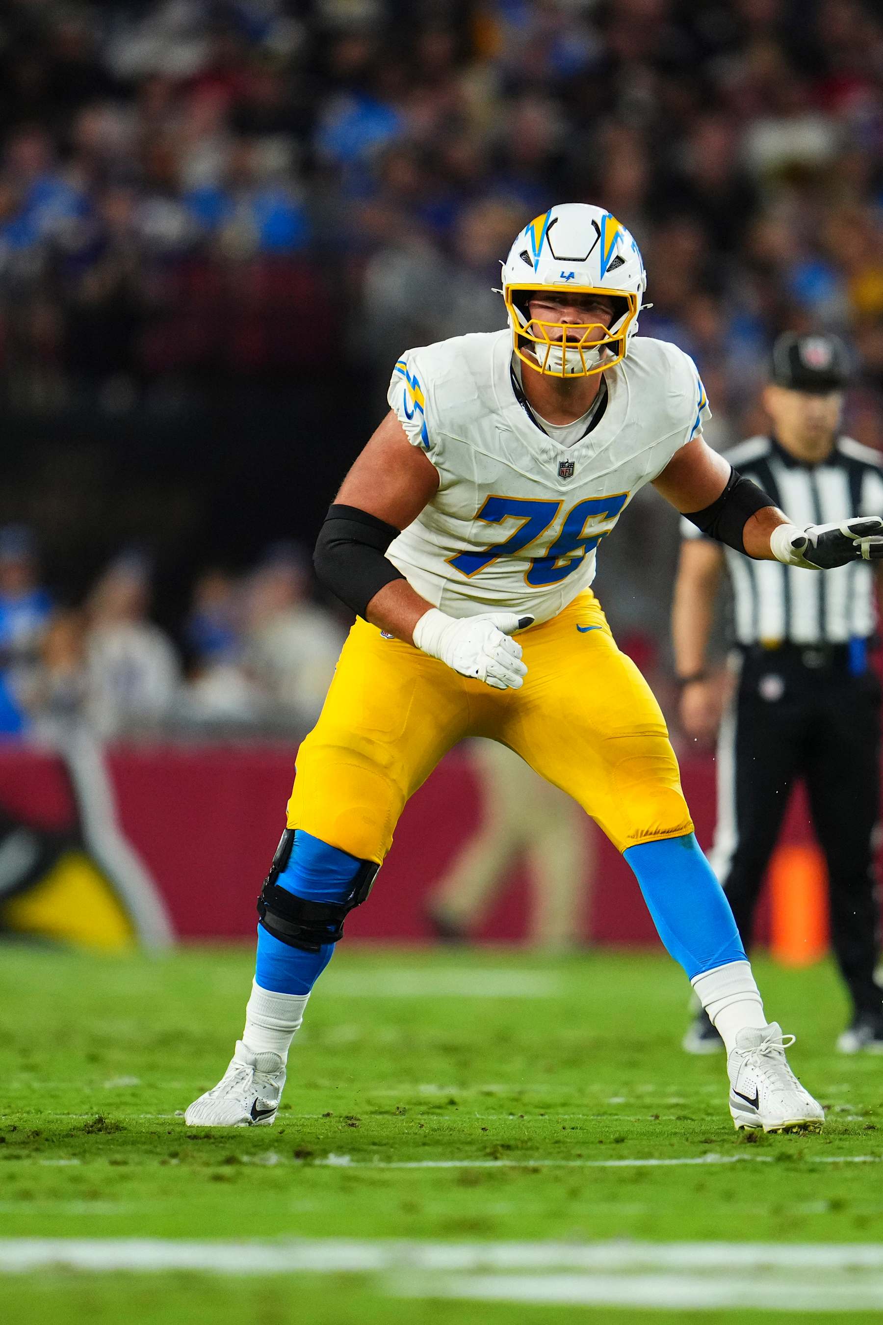 GLENDALE, AZ - OCTOBER 21: Joe Alt #76 of the Los Angeles Chargers drops back to block during an NFL football game against the Arizona Cardinals at State Farm Stadium on October 21, 2024 in Glendale, Arizona. (Photo by Cooper Neill/Getty Images)