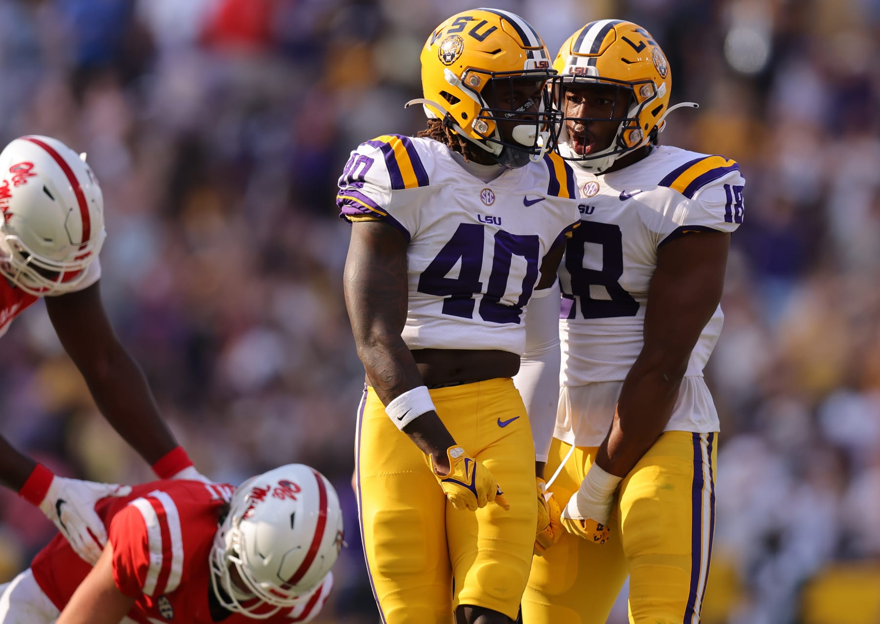 BATON ROUGE, LOUISIANA - OCTOBER 22: Harold Perkins Jr. #40 of the LSU Tigers celebrates a sack during the first half against the Mississippi Rebels at Tiger Stadium on October 22, 2022 in Baton Rouge, Louisiana. (Photo by Jonathan Bachman/Getty Images)