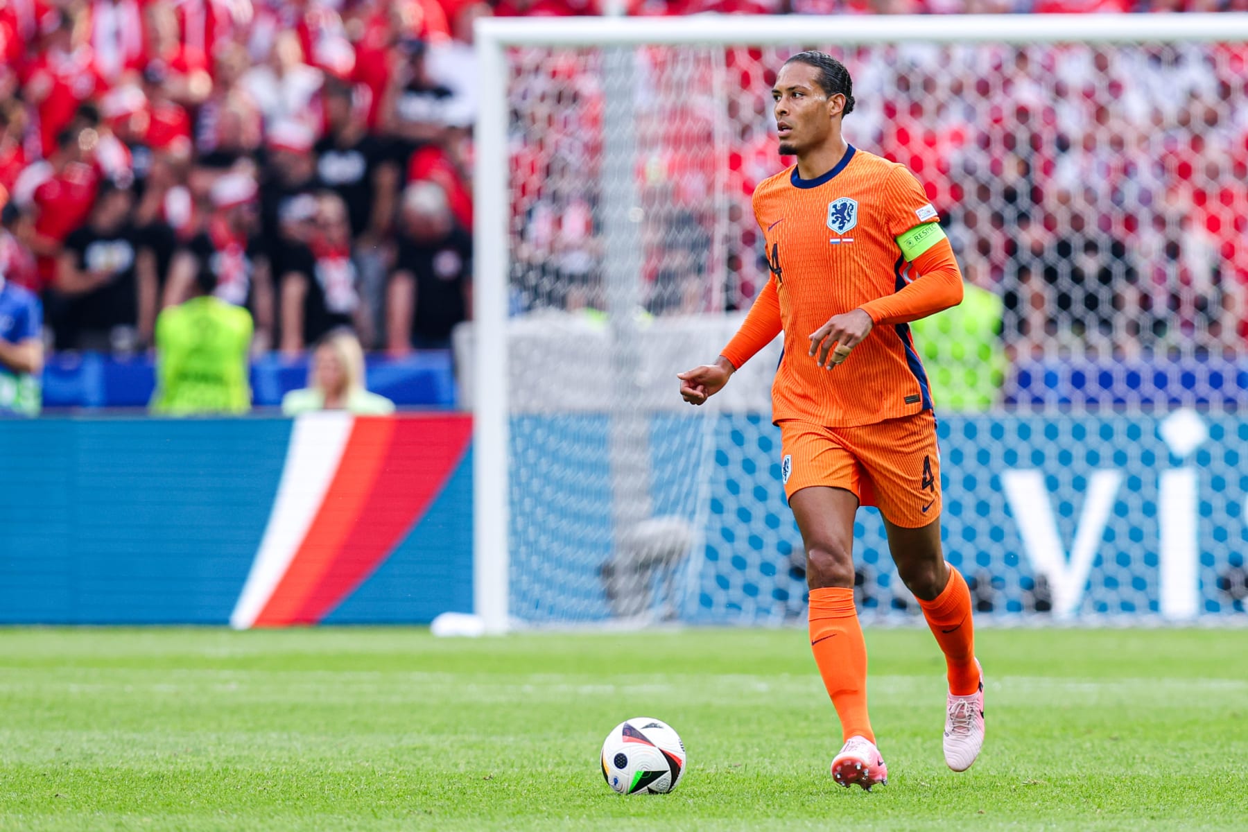 BERLIN, GERMANY - JUNE 25: Virgil van Dijk of the Netherlands runs with the ball during the Group D - UEFA EURO 2024 match between Netherlands and Austria at Olympiastadion on June 25, 2024 in Berlin, Germany. (Photo by Peter Lous/BSR Agency/Getty Images)