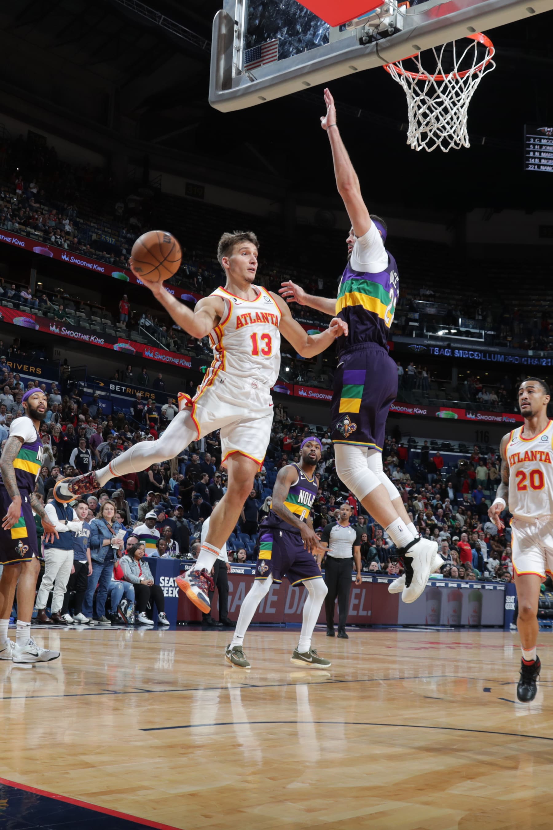 NEW ORLEANS, LA - FEBRUARY 7: Bogdan Bogdanovic #13 of the Atlanta Hawks passes the ball during the game against the New Orleans Pelicans on February 7, 2023 at the Smoothie King Center in New Orleans, Louisiana. NOTE TO USER: User expressly acknowledges and agrees that, by downloading and or using this Photograph, user is consenting to the terms and conditions of the Getty Images License Agreement. Mandatory Copyright Notice: Copyright 2023 NBAE (Photo by Layne Murdoch Jr./NBAE via Getty Images)