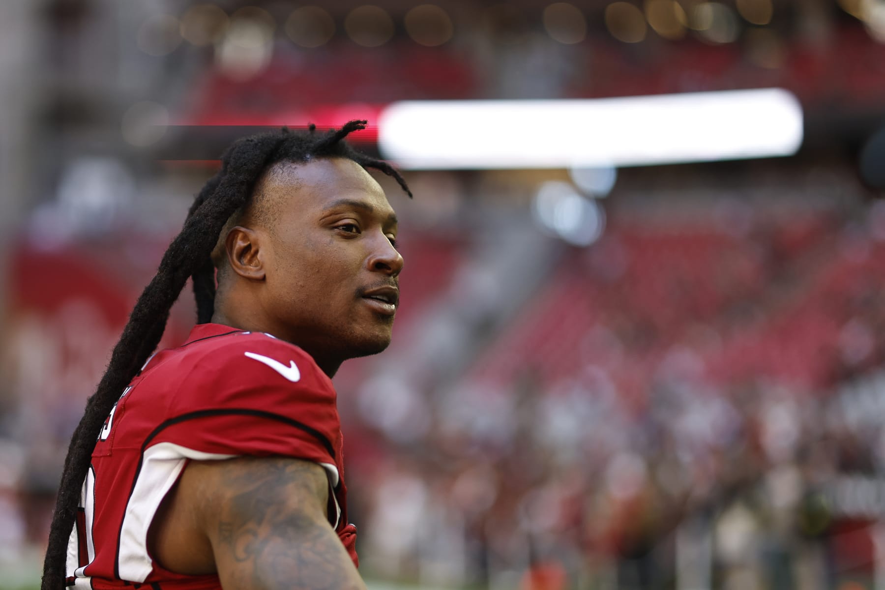 GLENDALE, ARIZONA - NOVEMBER 06: DeAndre Hopkins #10 of the Arizona Cardinals reacts prior to an NFL Football game between the Arizona Cardinals and the Seattle Seahawks at State Farm Stadium on November 06, 2022 in Glendale, Arizona. (Photo by Michael Owens/Getty Images)