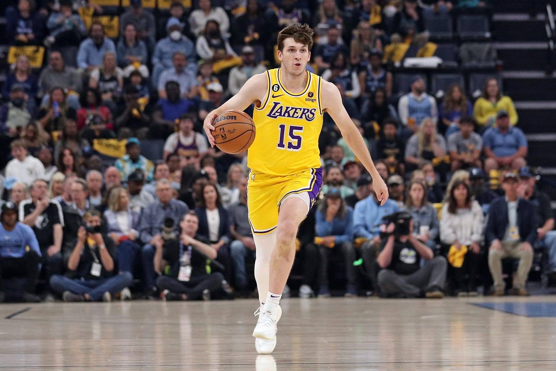 MEMPHIS, TENNESSEE - APRIL 26: Austin Reaves #15 of the Los Angeles Lakers brings the ball upcourt against the Memphis Grizzlies during Game Five of the Western Conference First Round Playoffs at FedExForum on April 26, 2023 in Memphis, Tennessee. NOTE TO USER: User expressly acknowledges and agrees that, by downloading and or using this photograph, User is consenting to the terms and conditions of the Getty Images License Agreement. (Photo by Justin Ford/Getty Images)