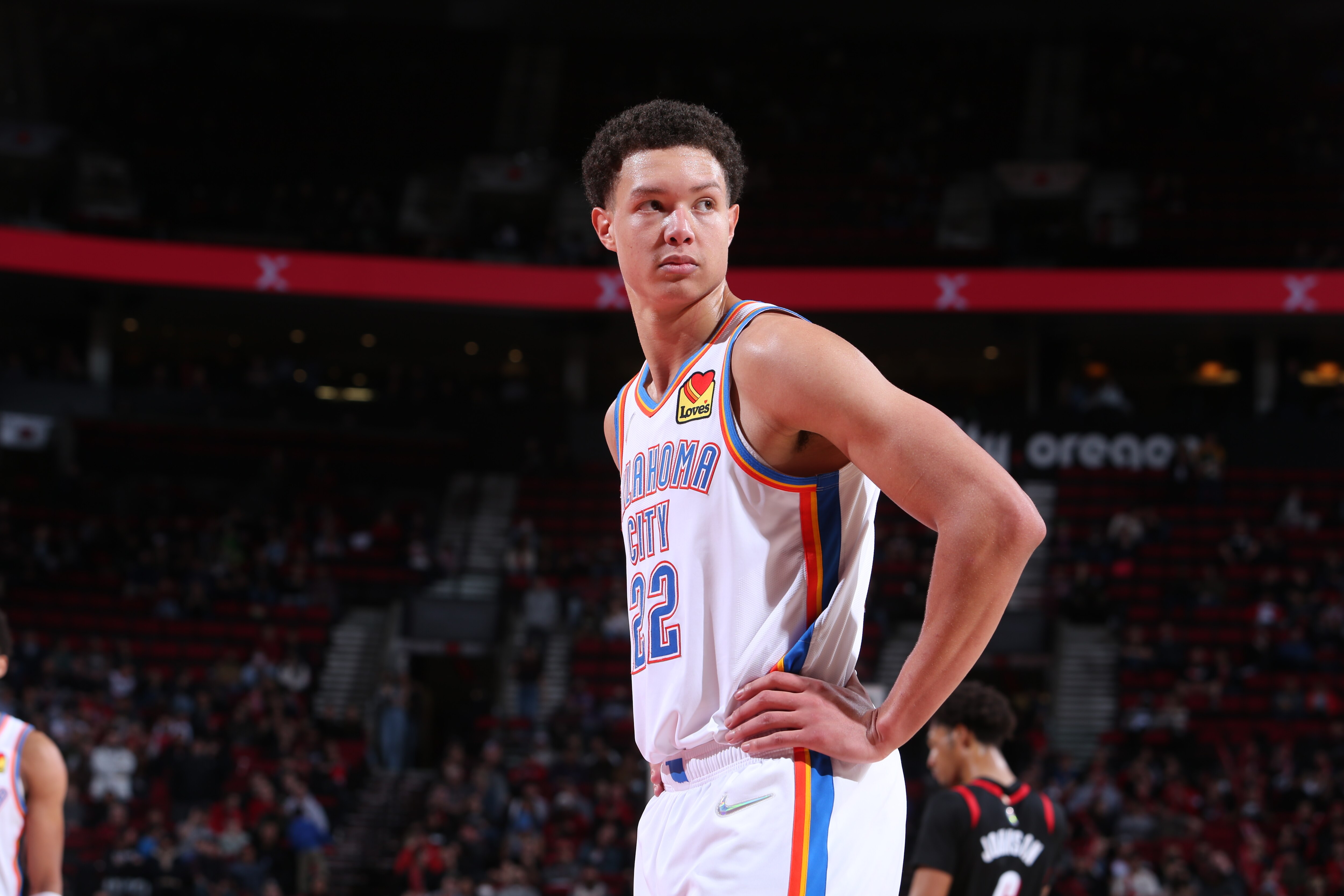 PORTLAND, OR - MARCH 28: Isaiah Roby #22 of the Oklahoma City Thunder looks on during the game against the Portland Trail Blazers on March 28, 2022 at the Moda Center Arena in Portland, Oregon. NOTE TO USER: User expressly acknowledges and agrees that, by downloading and or using this photograph, user is consenting to the terms and conditions of the Getty Images License Agreement. Mandatory Copyright Notice: Copyright 2022 NBAE (Photo by Sam Forencich/NBAE via Getty Images)