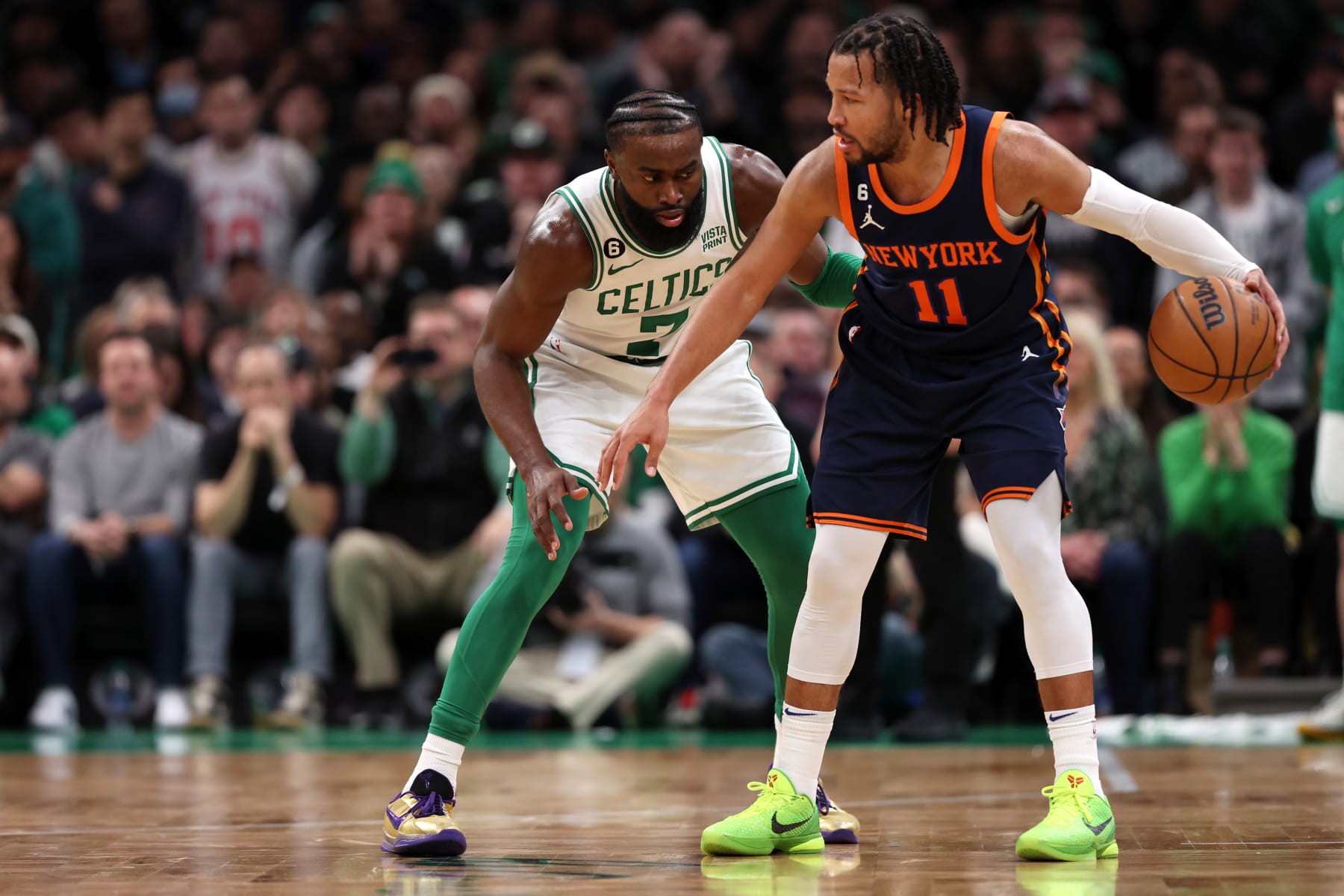 BOSTON, MASSACHUSETTS - JANUARY 26: Jaylen Brown #7 of the Boston Celtics defends Jalen Brunson #11 of the New York Knicks during the second half at TD Garden on January 26, 2023 in Boston, Massachusetts. The Knicks defeat the Celtics 120-117 in overtime. NOTE TO USER: User expressly acknowledges and agrees that, by downloading and or using this photograph, User is consenting to the terms and conditions of the Getty Images License Agreement.  (Photo by Maddie Meyer/Getty Images)