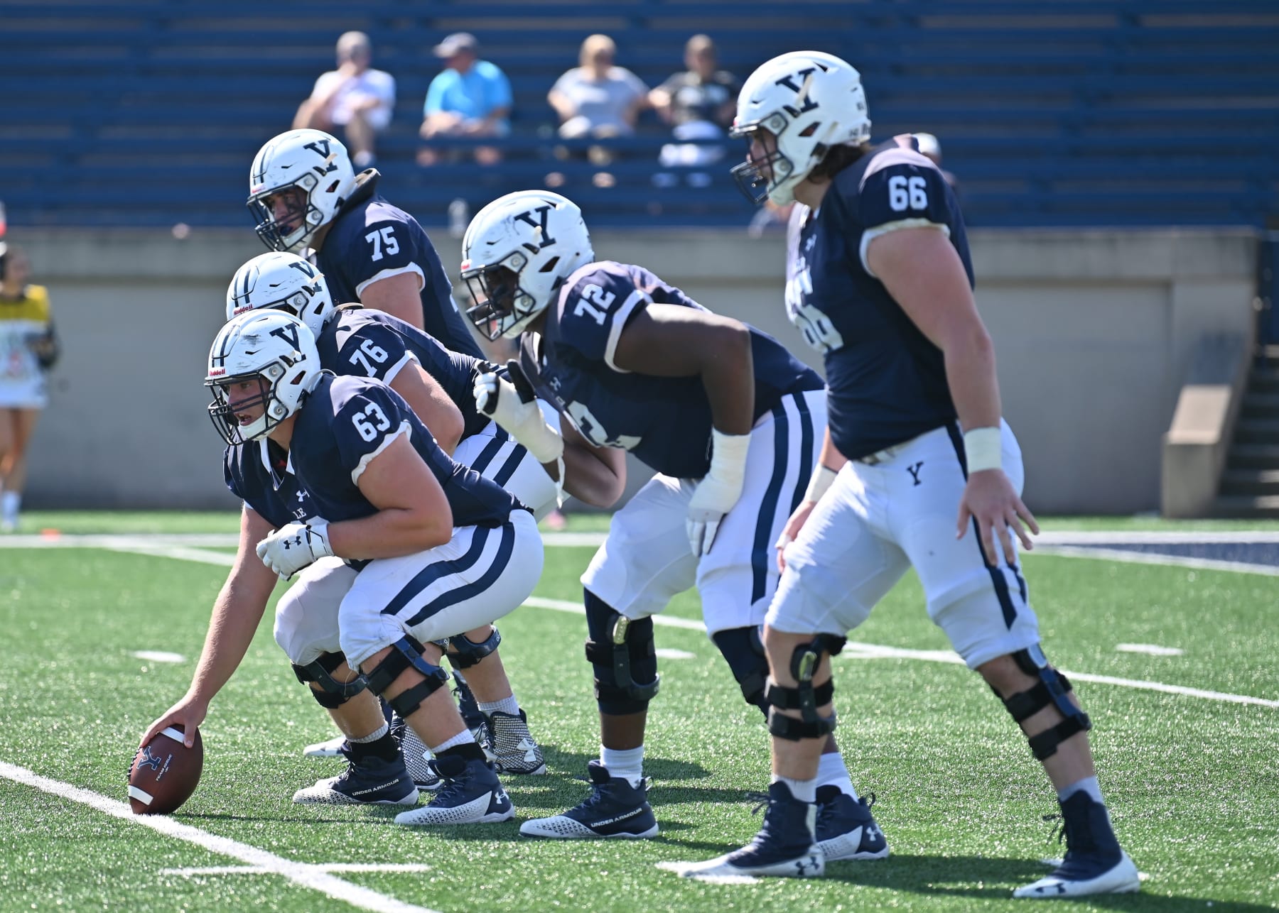 NEW HAVEN, CT - SEPTEMBER 18: Yale Bulldogs offensive lineman Jonathon Durand (63) leads the offensive line followed by Yale Bulldogs offensive lineman Kiran Amegadjie (72) and Yale Bulldogs offensive lineman Nick Gargiulo (66) during the game as the Holy Cross Crusaders take on the Yale Bulldogs on September 18, 2021, at the Yale Bowl in New Haven, Connecticut. (Photo by Williams Paul/Icon Sportswire via Getty Images)