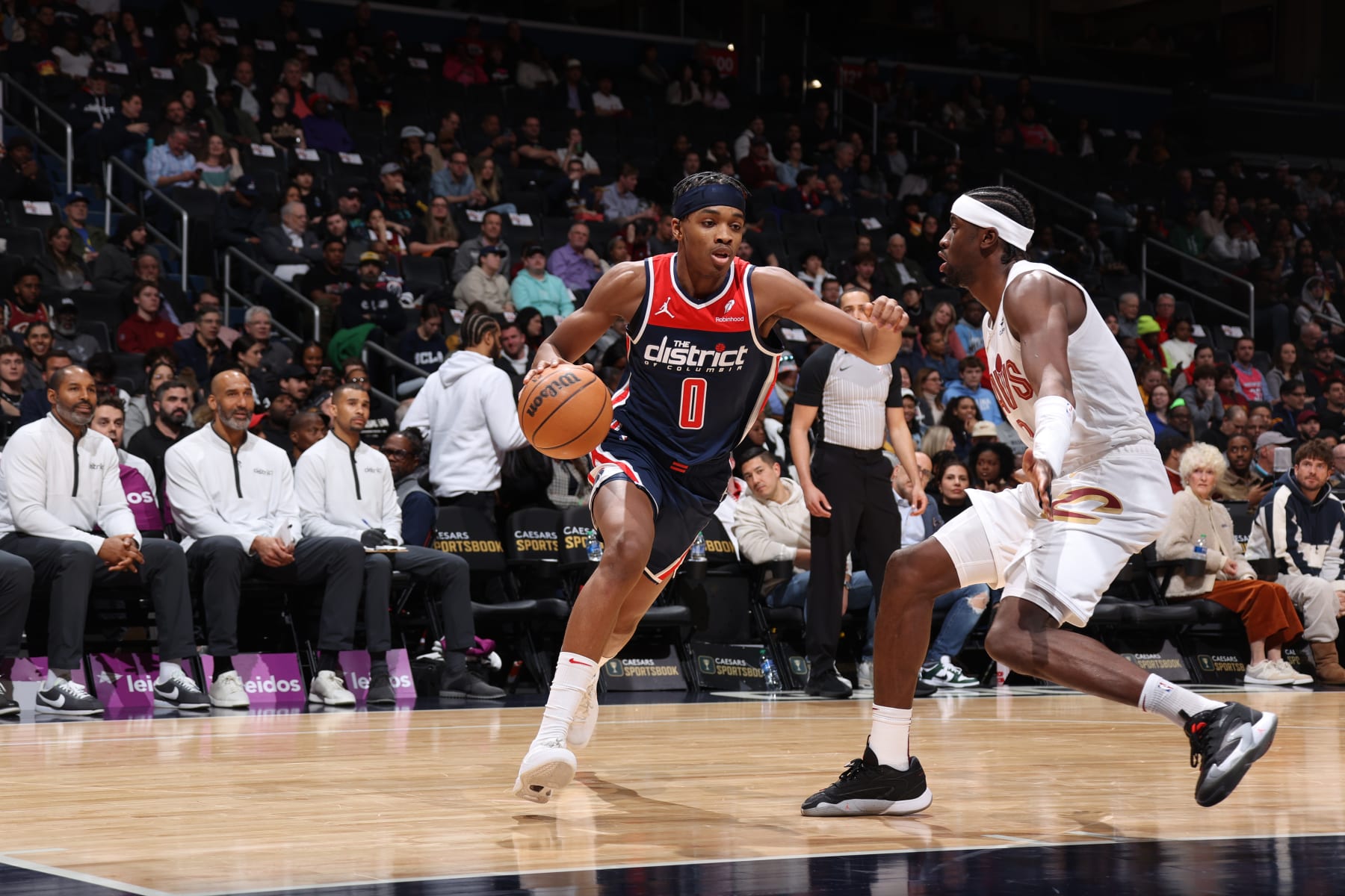WASHINGTON, DC -  FEBRUARY 7: Bilal Coulibaly #0 of the Washington Wizards drives to the basket against Donovan Mitchell #45 of the Cleveland Cavaliers during the game on February 7, 2024 at Capital One Arena in Washington, DC. NOTE TO USER: User expressly acknowledges and agrees that, by downloading and or using this Photograph, user is consenting to the terms and conditions of the Getty Images License Agreement. Mandatory Copyright Notice: Copyright 2024 NBAE (Photo by Stephen Gosling/NBAE via Getty Images)