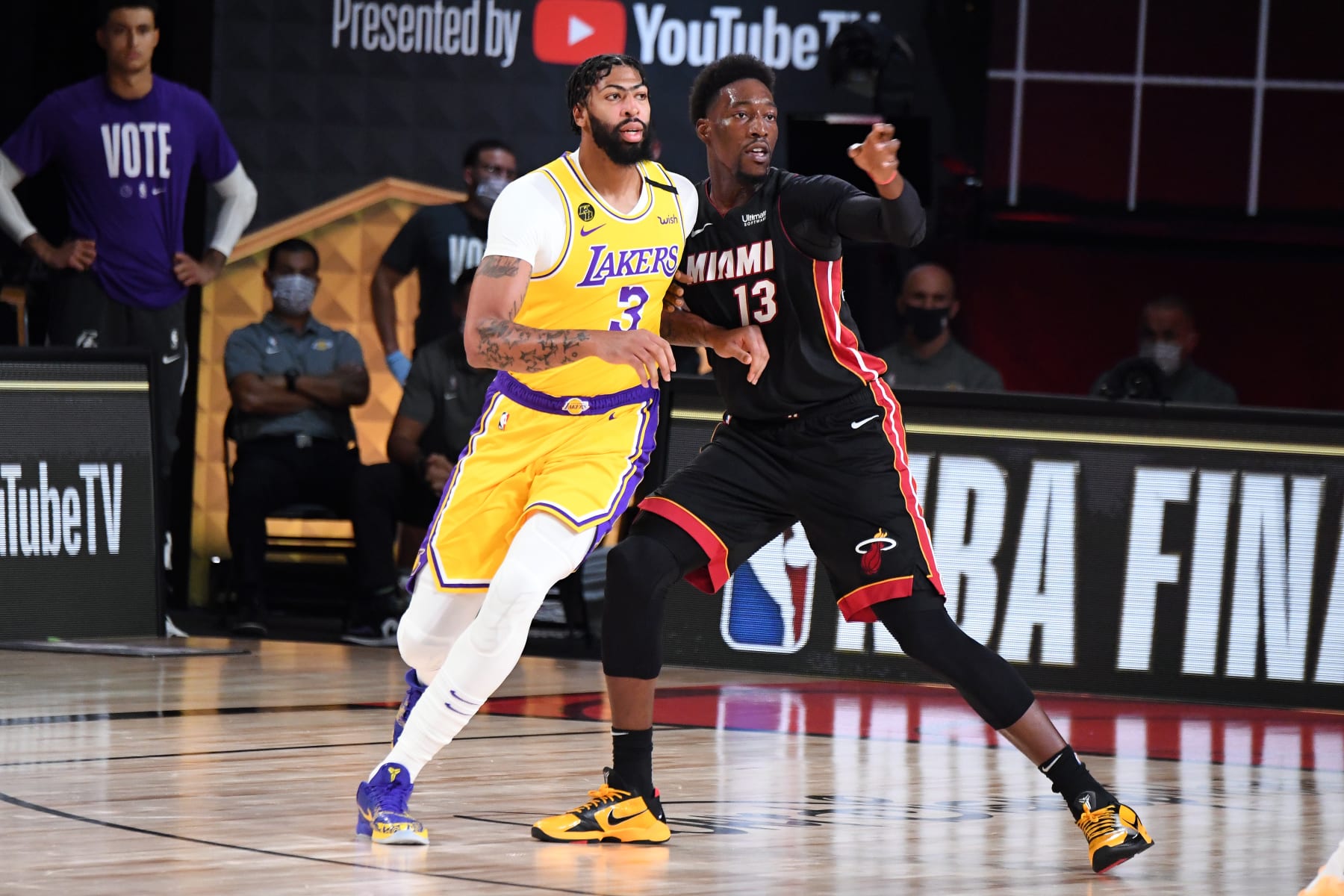 ORLANDO, FL - OCTOBER 6: Anthony Davis #3 of the Los Angeles Lakers and Bam Adebayo #13 of the Miami Heat look on during Game Four of the NBA Finals on October 6, 2020 at The AdventHealth Arena at ESPN Wide World Of Sports Complex in Orlando, Florida. NOTE TO USER: User expressly acknowledges and agrees that, by downloading and/or using this Photograph, user is consenting to the terms and conditions of the Getty Images License Agreement. Mandatory Copyright Notice: Copyright 2020 NBAE (Photo by Andrew D. Bernstein/NBAE via Getty Images)