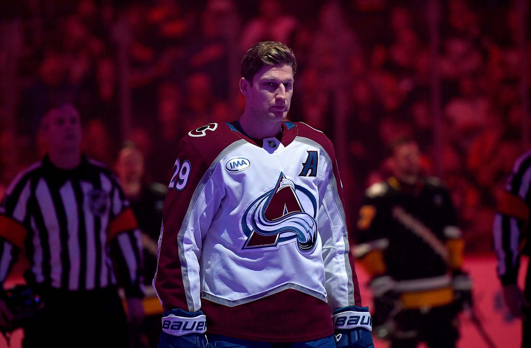 PITTSBURGH, PA - DECEMBER 10:  Nathan MacKinnon #29 of the Colorado Avalanche stands during the National Anthem against the Pittsburgh Penguins at PPG PAINTS Arena on December 10, 2024 in Pittsburgh, Pennsylvania. (Photo by Joe Sargent/NHLI via Getty Images)