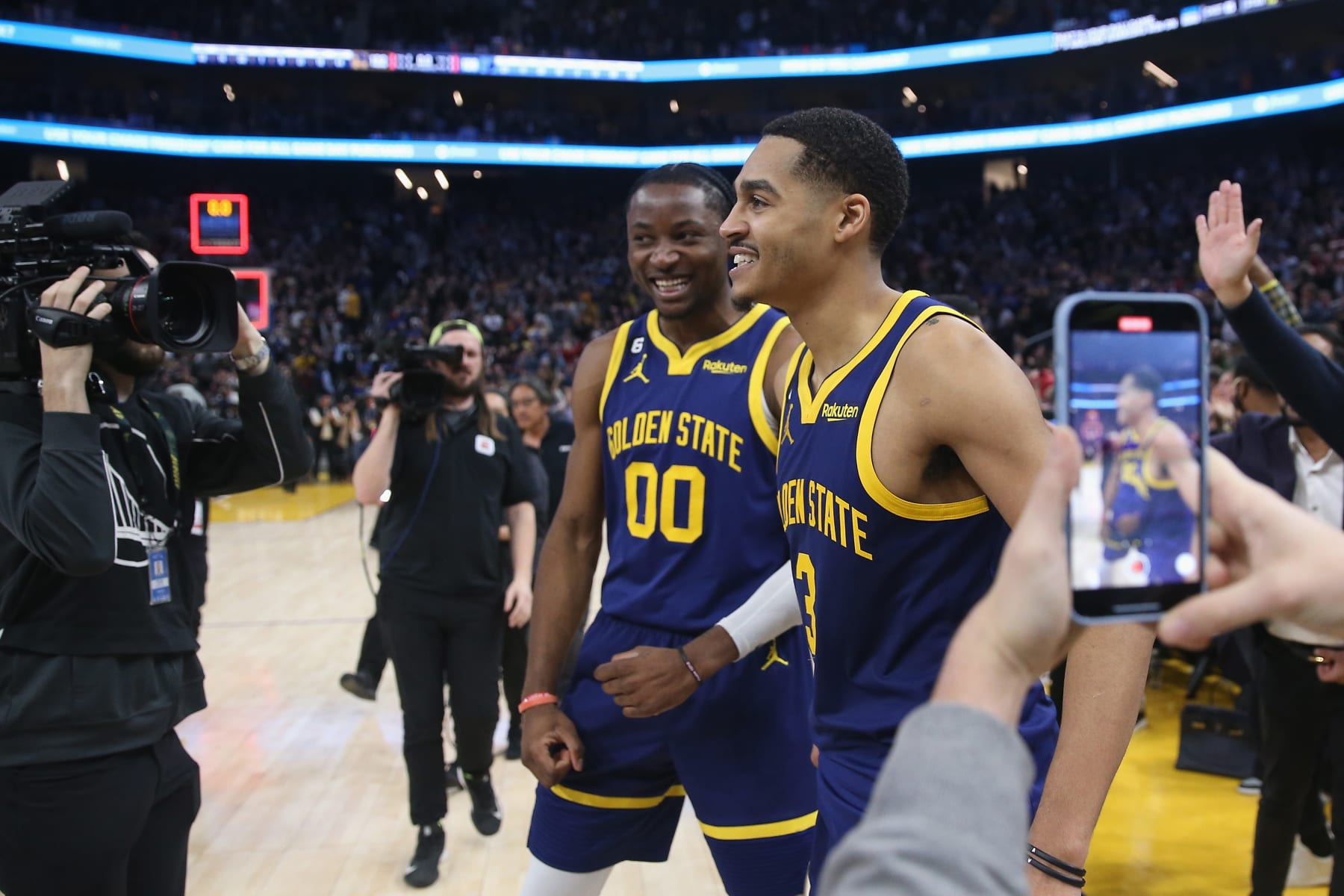 SAN FRANCISCO, CALIFORNIA - JANUARY 25: Jordan Poole #3 of the Golden State Warriors celebrates with teammates after a win against the Memphis Grizzlies at Chase Center on January 25, 2023 in San Francisco, California. NOTE TO USER: User expressly acknowledges and agrees that, by downloading and/or using this photograph, User is consenting to the terms and conditions of the Getty Images License Agreement. (Photo by Lachlan Cunningham/Getty Images)