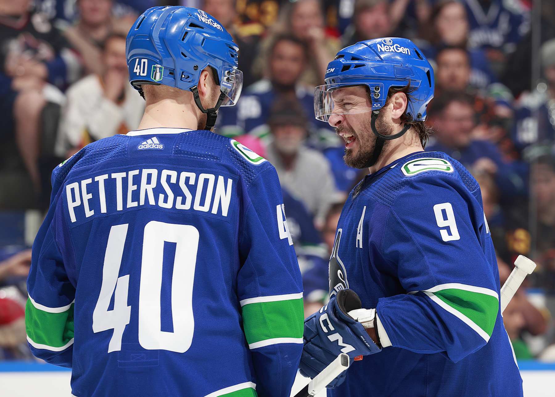 VANCOUVER, CANADA - MAY 10: J.T. Miller #9 of the Vancouver Canucks talks to teammate Elias Pettersson #40 in Game Two of the Second Round of the 2024 Stanley Cup Playoffs against the Edmonton Oilers at Rogers Arena on May 10, 2024 in Vancouver, British Columbia, Canada.  (Photo by Jeff Vinnick/NHLI via Getty Images)