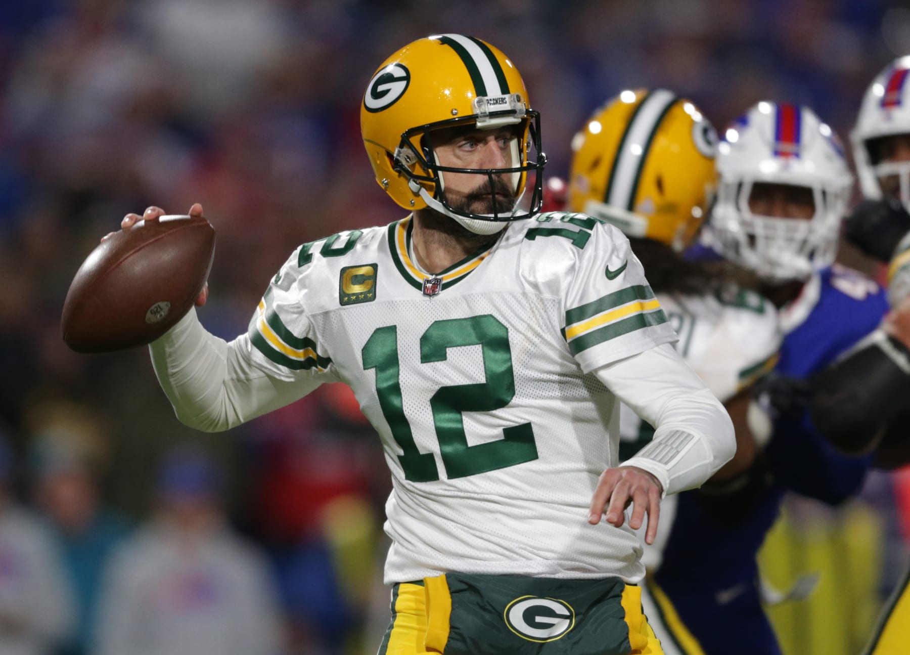 ORCHARD PARK, NEW YORK - OCTOBER 30: Aaron Rodgers #12 of the Green Bay Packers throws a pass during the first quarter against the Buffalo Bills at Highmark Stadium on October 30, 2022 in Orchard Park, New York. (Photo by Joshua Bessex/Getty Images)