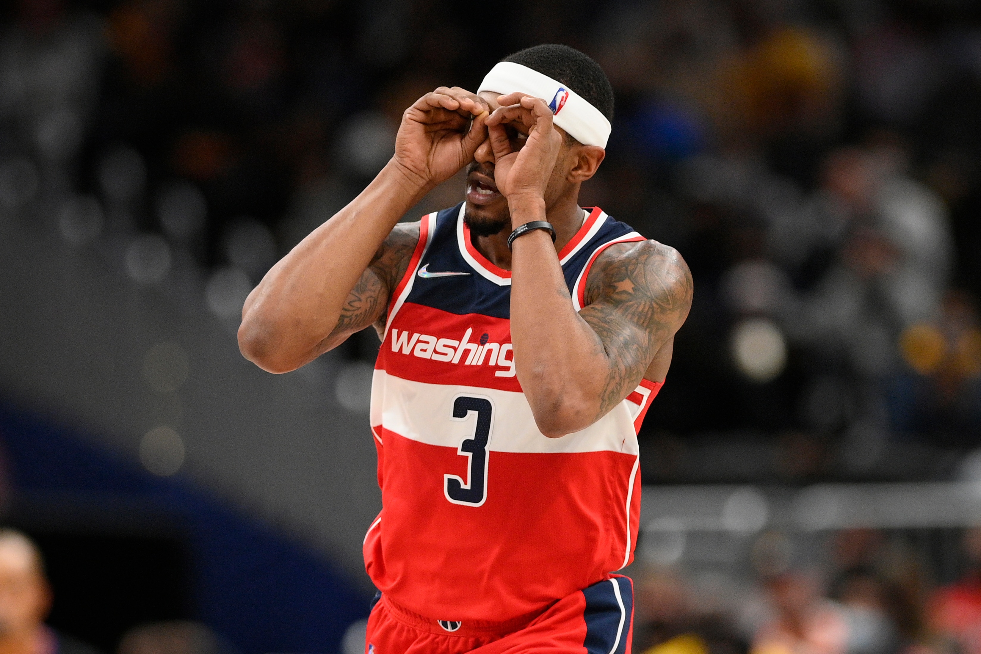 Washington Wizards guard Bradley Beal (3) reacts after he scored a basket during the second half of an NBA basketball game against the Cleveland Cavaliers, Thursday, Dec. 30, 2021, in Washington. The Wizards won 110-93. (AP Photo/Nick Wass)