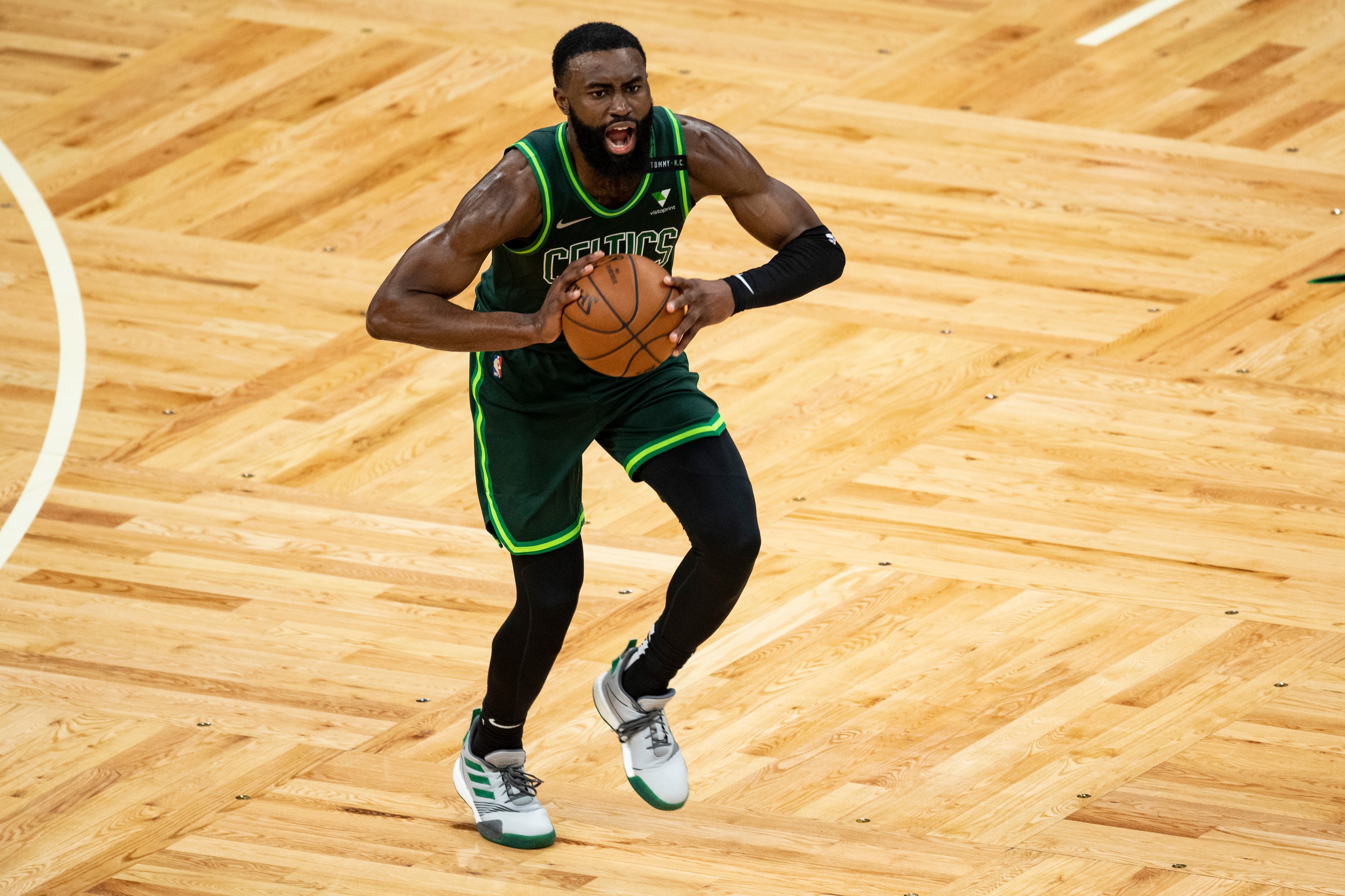 BOSTON, MASSACHUSETTS - MAY 02: Jaylen Brown #7 of the Boston Celtics reacts as he looks to pass during the second half against the Portland Trail Blazers at TD Garden on May 02, 2021 in Boston, Massachusetts. NOTE TO USER: User expressly acknowledges and agrees that, by downloading and or using this photograph, User is consenting to the terms and conditions of the Getty Images License Agreement.  (Photo by Maddie Malhotra/Getty Images)