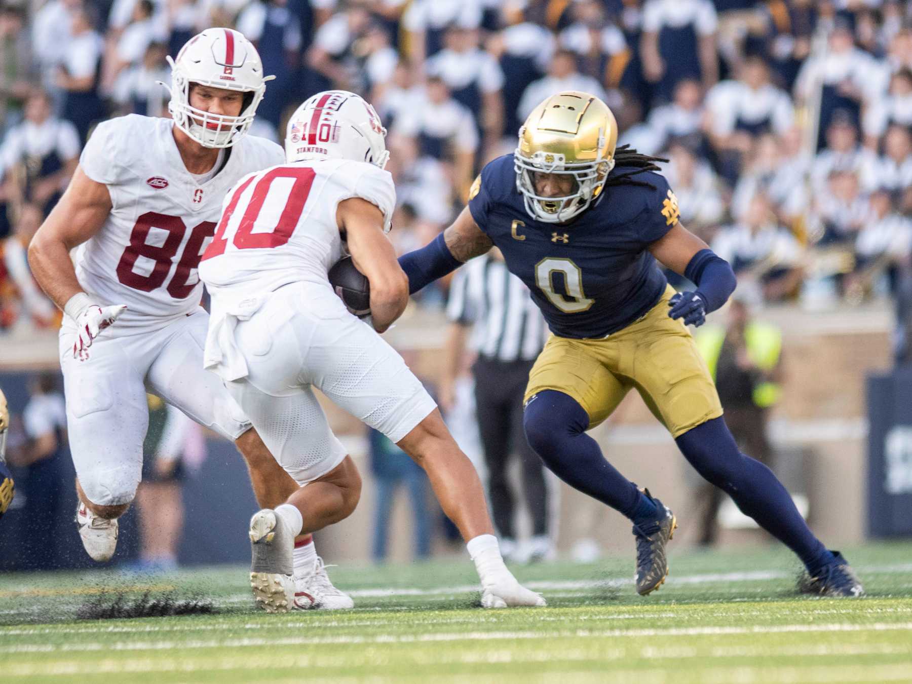 SOUTH BEND, IN - OCTOBER 12:Notre Dame Fighting Irish safety Xavier Watts (0) defends Stanford Cardinal wide receiver Emmett Mosley V (10) during the game between the Notre Dame Fighting Irish and the Stanford Cardinal at Notre Dame Stadium in South Bend, IN on October 12, 2024. (Photo by Joseph Weiser/Icon Sportswire via Getty Images)