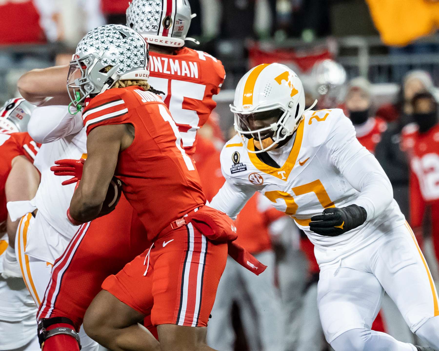 COLUMBUS, OHIO - DECEMBER 21: James Pearce Jr. #27 of the Tennessee Volunteers comes down the line after Quinshon Judkins #1 of the Ohio State Buckeyes during a game between the Tennessee Volunteers and the Ohio State Buckeyes at Ohio Stadium on December 21, 2024 in Columbus, Ohio. (Photo by Steve Limentani/ISI Photos/Getty Images)