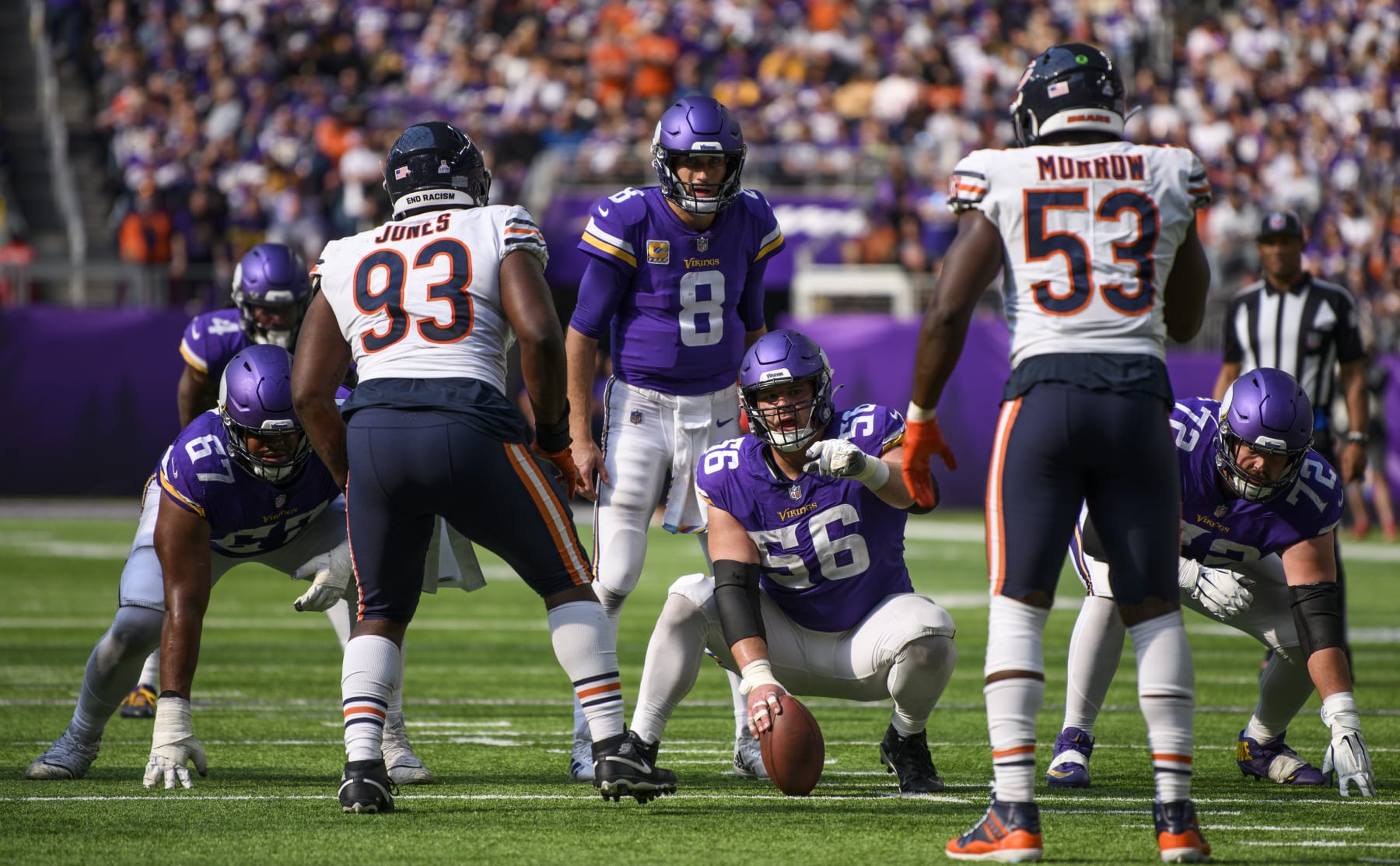 MINNEAPOLIS, MN - OCTOBER 09: Garrett Bradbury #56 of the Minnesota Vikings holds the ball in the fourth quarter of the game against the Chicago Bears at U.S. Bank Stadium on October 9, 2022 in Minneapolis, Minnesota. (Photo by Stephen Maturen/Getty Images)