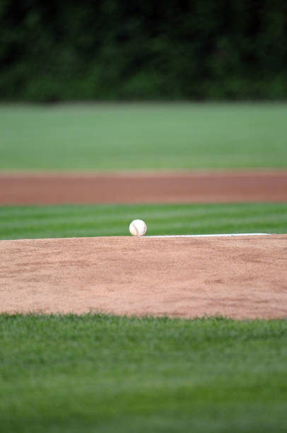 CHICAGO, IL - AUGUST 3: A baseball on the pitcher's mound prior to a game between the Milwaukee Brewers and Chicago Cubs at Wrigley Field on August 3, 2010 in Chicago, Illinois. Milwaukee won 4-3. (Photo by Diamond Images/Getty Images)