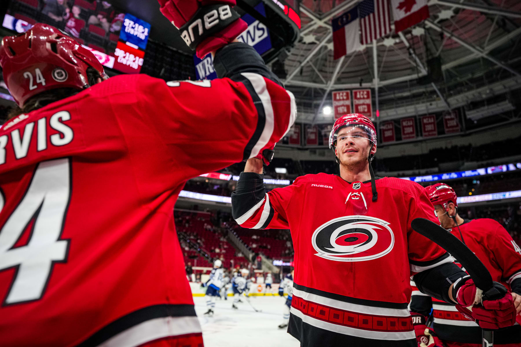 RALEIGH, NORTH CAROLINA - MARCH 02: Andrei Svechnikov #37 of the Carolina Hurricanes and Seth Jarvis #24 during warmups prior to a game against the Winnipeg Jets at PNC Arena on March 02, 2024 in Raleigh, North Carolina. (Photo by Josh Lavallee/NHLI via Getty Images)