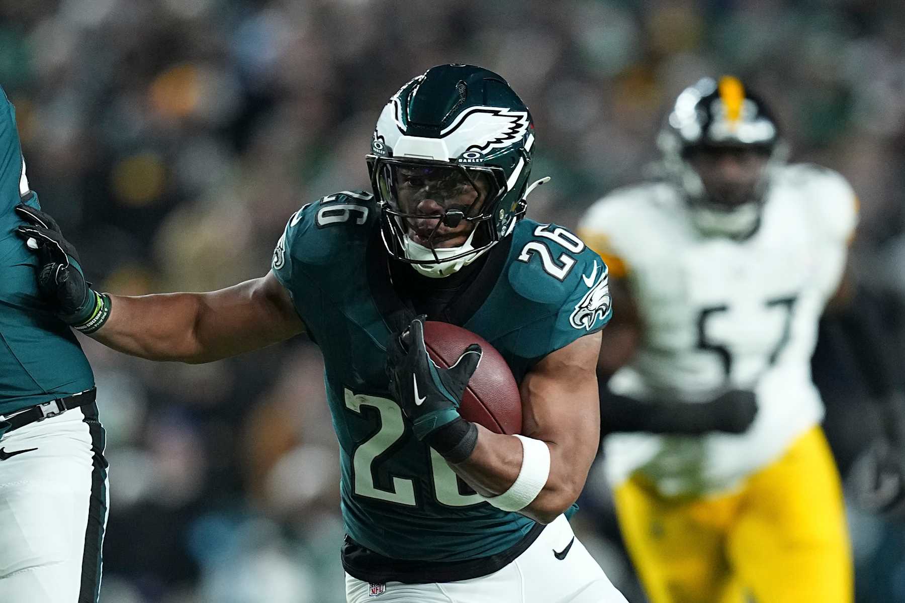 PHILADELPHIA, PENNSYLVANIA - DECEMBER 15: Saquon Barkley #26 of the Philadelphia Eagles runs with the ball against the Pittsburgh Steelers and Philadelphia Eagles at Lincoln Financial Field on December 15, 2024 in Philadelphia, Pennsylvania. (Photo by Mitchell Leff/Getty Images)