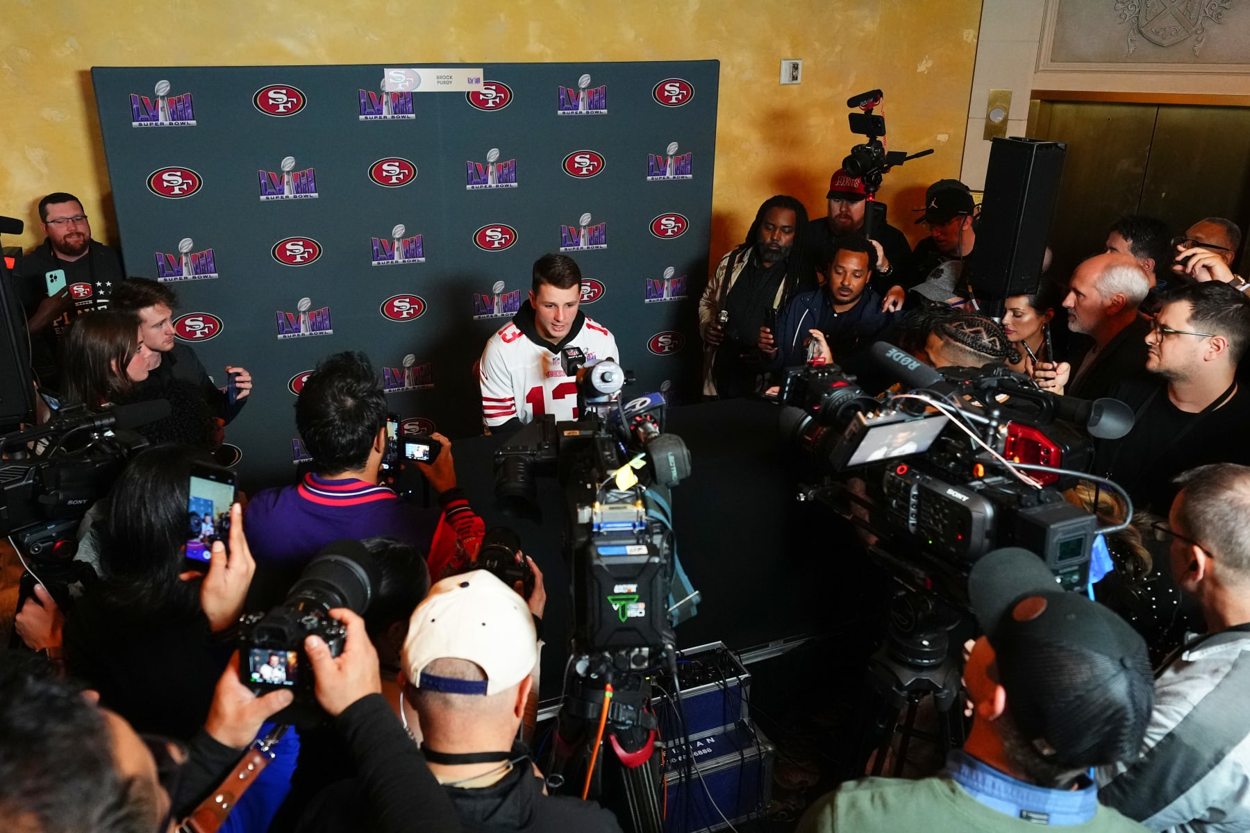 HENDERSON, NEVADA - FEBRUARY 06: Brock Purdy of the San Francisco 49ers speaks to the media during San Francisco 49ers media availability ahead of Super Bowl LVIII at Hilton Lake Las Vegas Resort and Spa on February 06, 2024 in Henderson, Nevada. (Photo by Chris Unger/Getty Images)