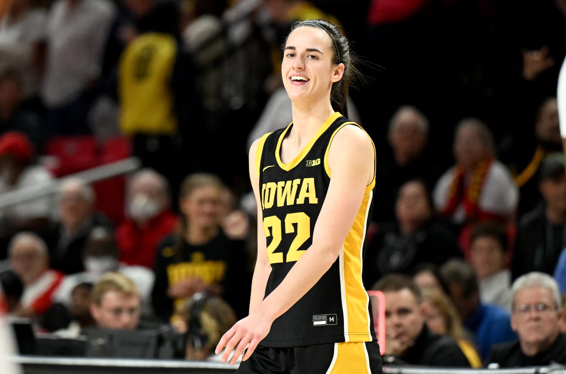 COLLEGE PARK, MARYLAND - FEBRUARY 03: Caitlin Clark #22 of the Iowa Hawkeyes celebrates in the fourth quarter against the Maryland Terrapins at Xfinity Center on February 03, 2024 in College Park, Maryland. (Photo by G Fiume/Getty Images)