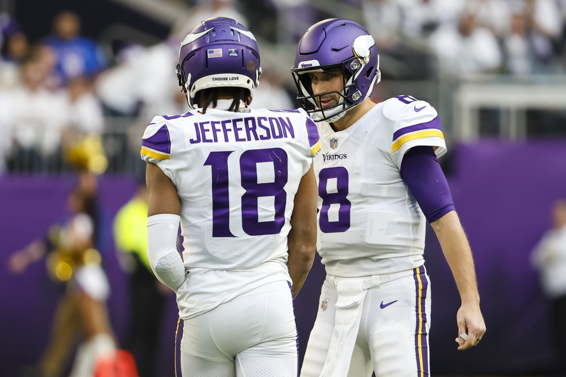 MINNEAPOLIS, MN - DECEMBER 24: Kirk Cousins #8 talks to Justin Jefferson #18 of the Minnesota Vikings in the first quarter of the game against the New York Giants at U.S. Bank Stadium on December 24, 2022 in Minneapolis, Minnesota. The Vikings defeated the Giants 27-24. (Photo by David Berding/Getty Images)